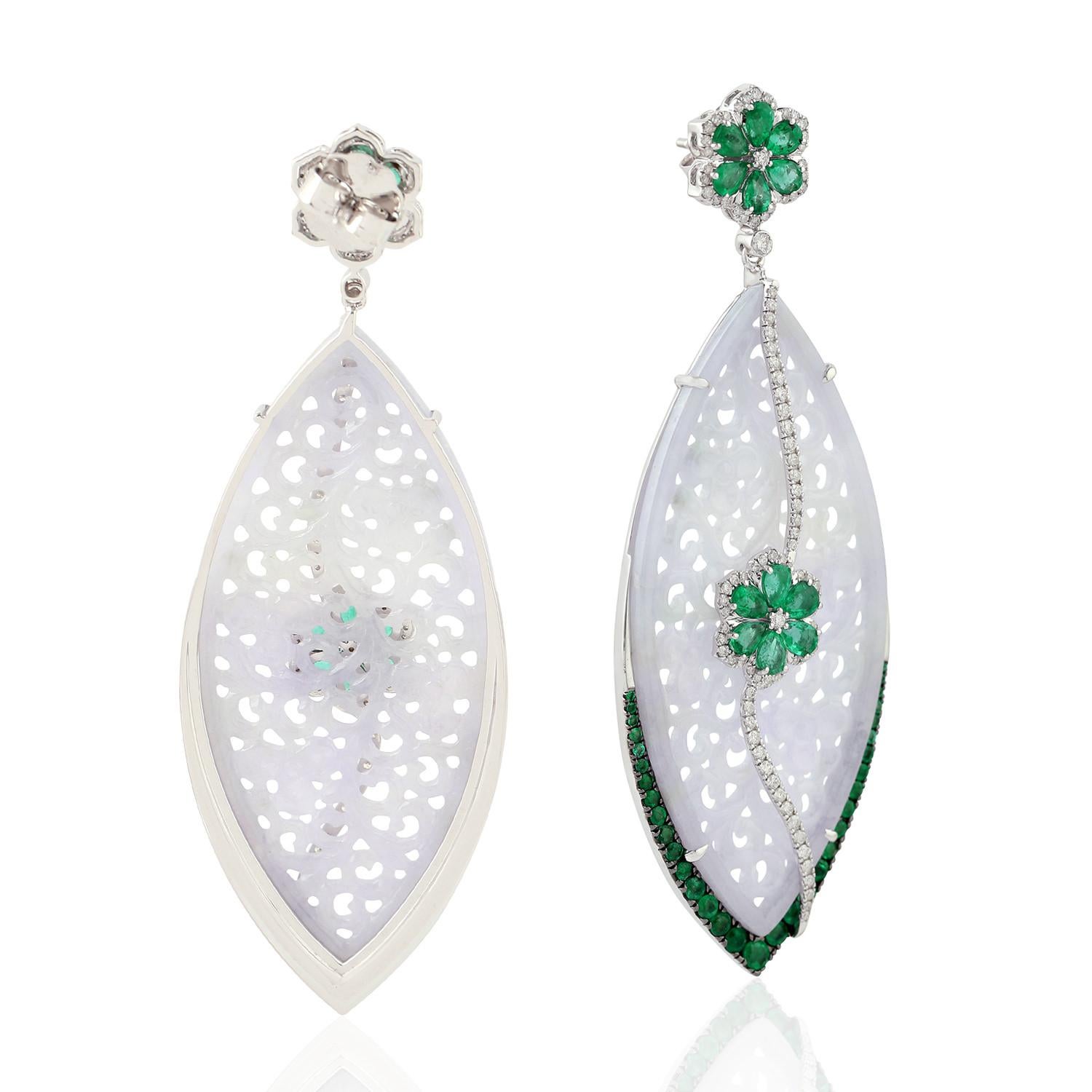 Stunning this White hand carved Jade with emerald and diamonds in 18K White gold is perfect for gifting and can be worn for any occasion.

Closure: Push Post

18KT:19.793gms
Diamond: 1.35ct
EMERALD: 5.84cts
JADE: 49.14cts

