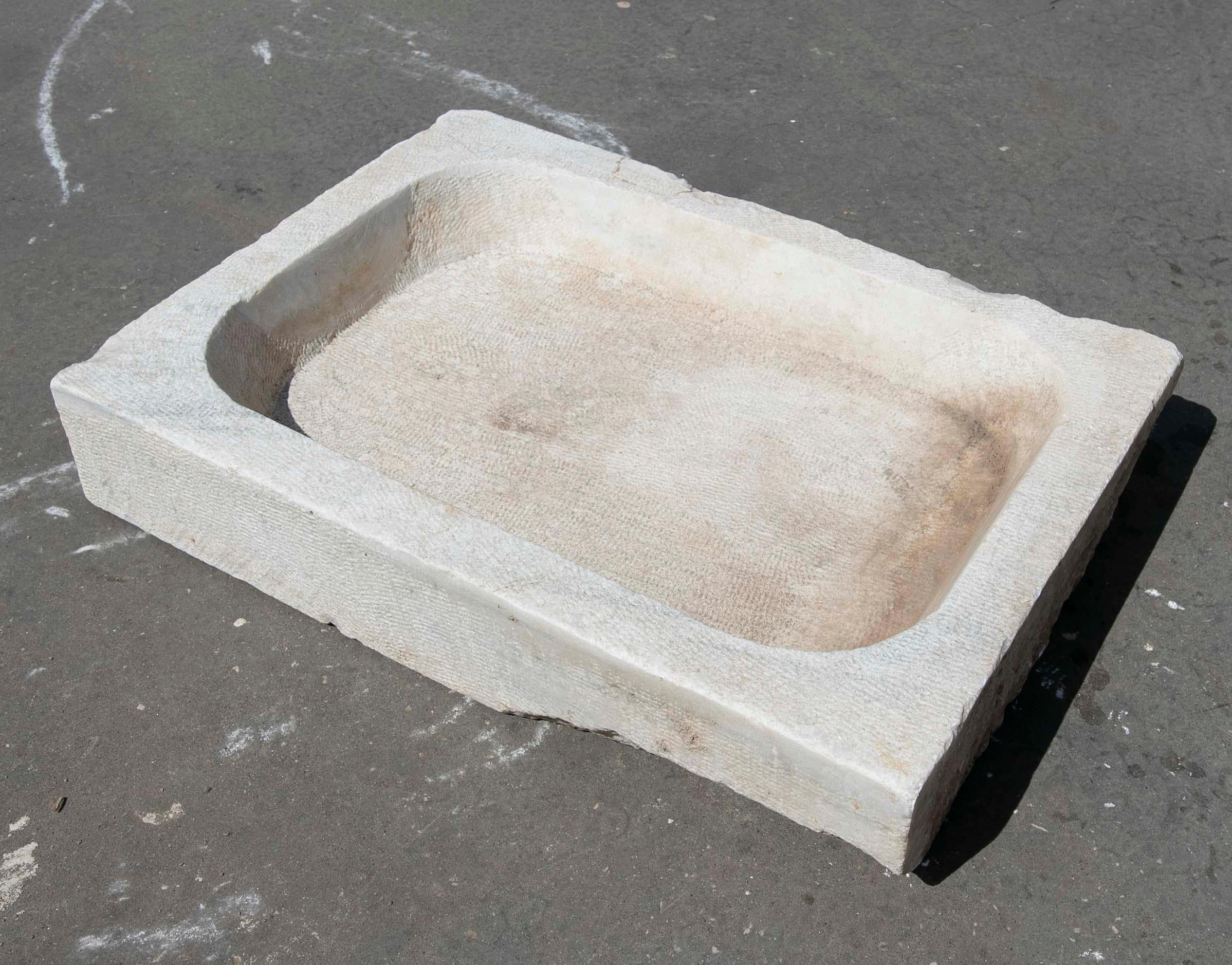 White hand carved Marble Washbasin with One Sink in a Single Block.