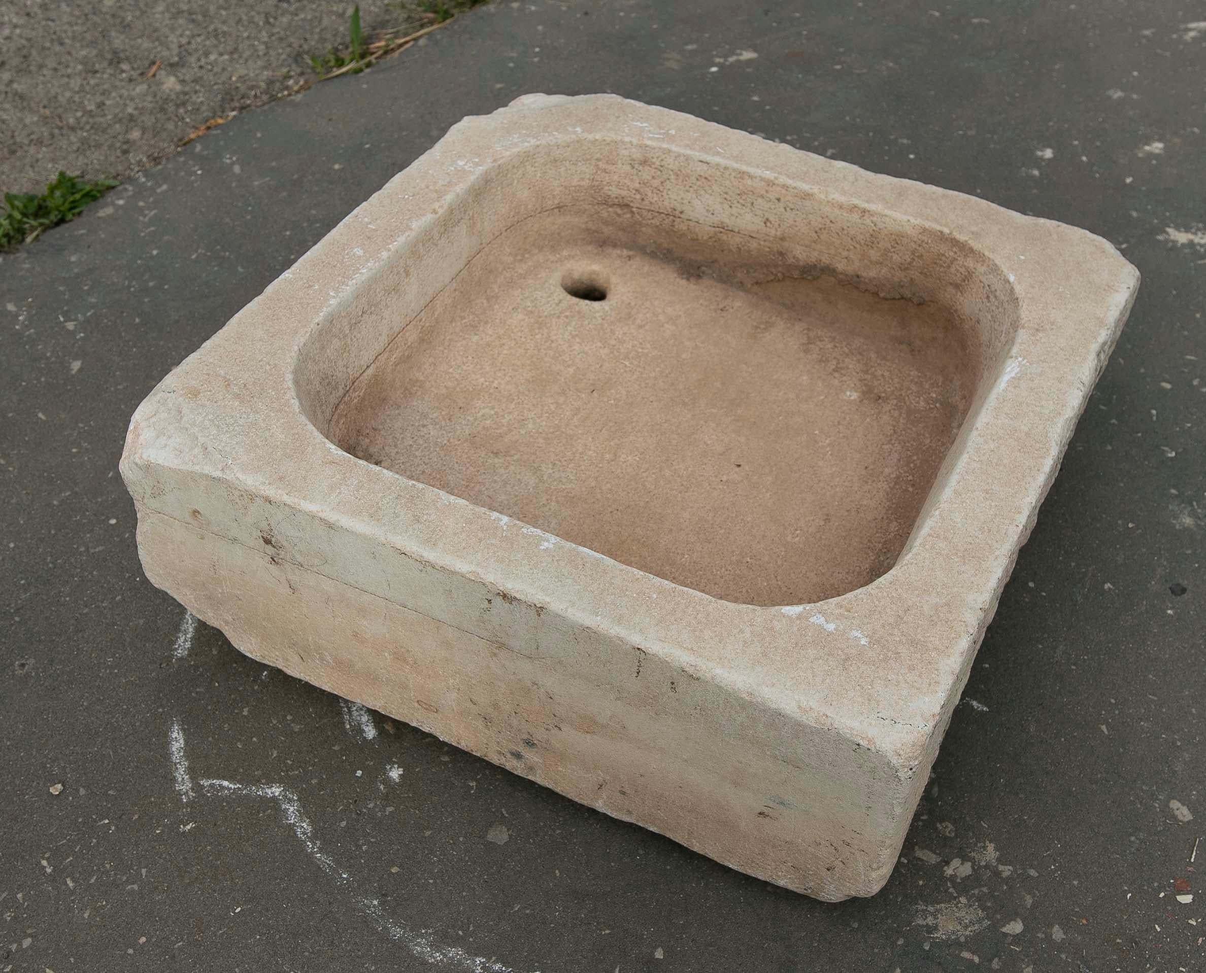 White Hand-Carved Marble Washbasin with One Sink in a Single Block.