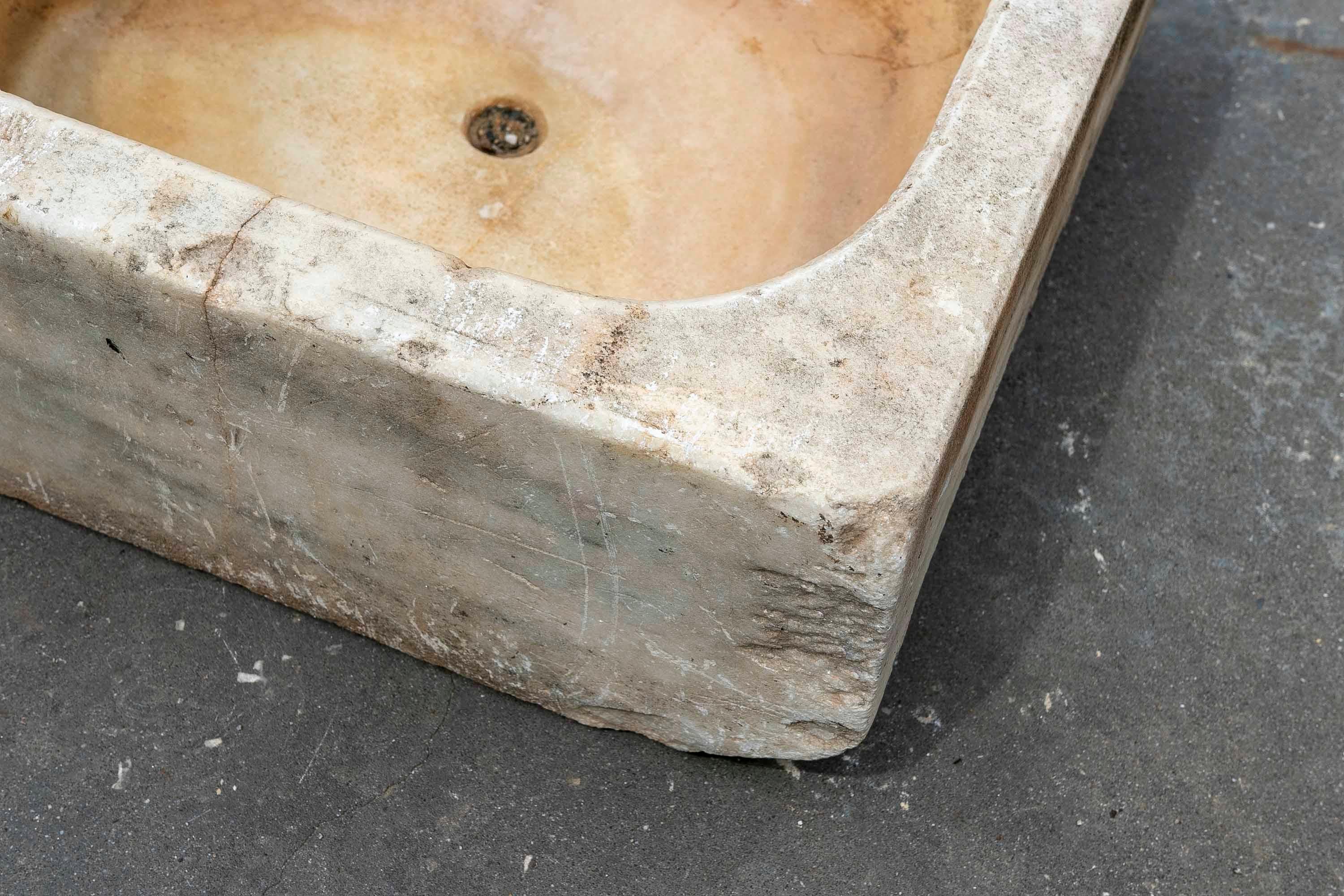 White Hand-Carved Marble Washbasin with One Sink in a Single Block.