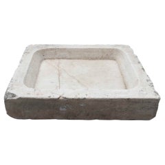 Lavabo de mármol blanco tallado a mano con un fregadero en un solo bloque