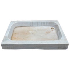 Lavabo de mármol blanco tallado a mano con un fregadero en un solo bloque