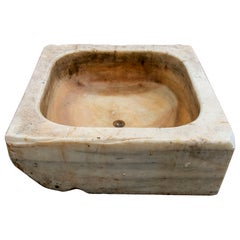 Lavabo in marmo bianco intagliato a mano con un lavabo in un unico blocco