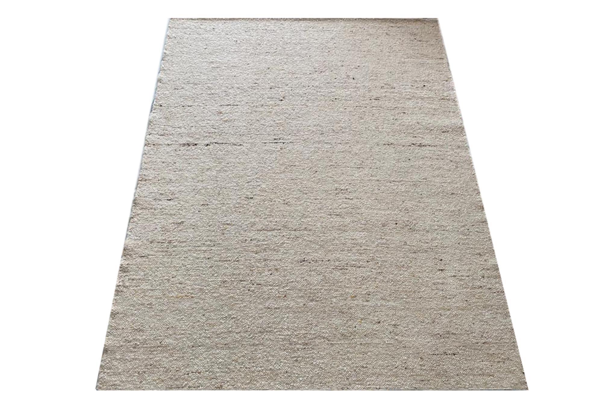 Hand-woven raw wool.

8' x 10'

New

Origin: India

Field Colors: White

Accent Colors: Ivory, Light-Brown, Brown