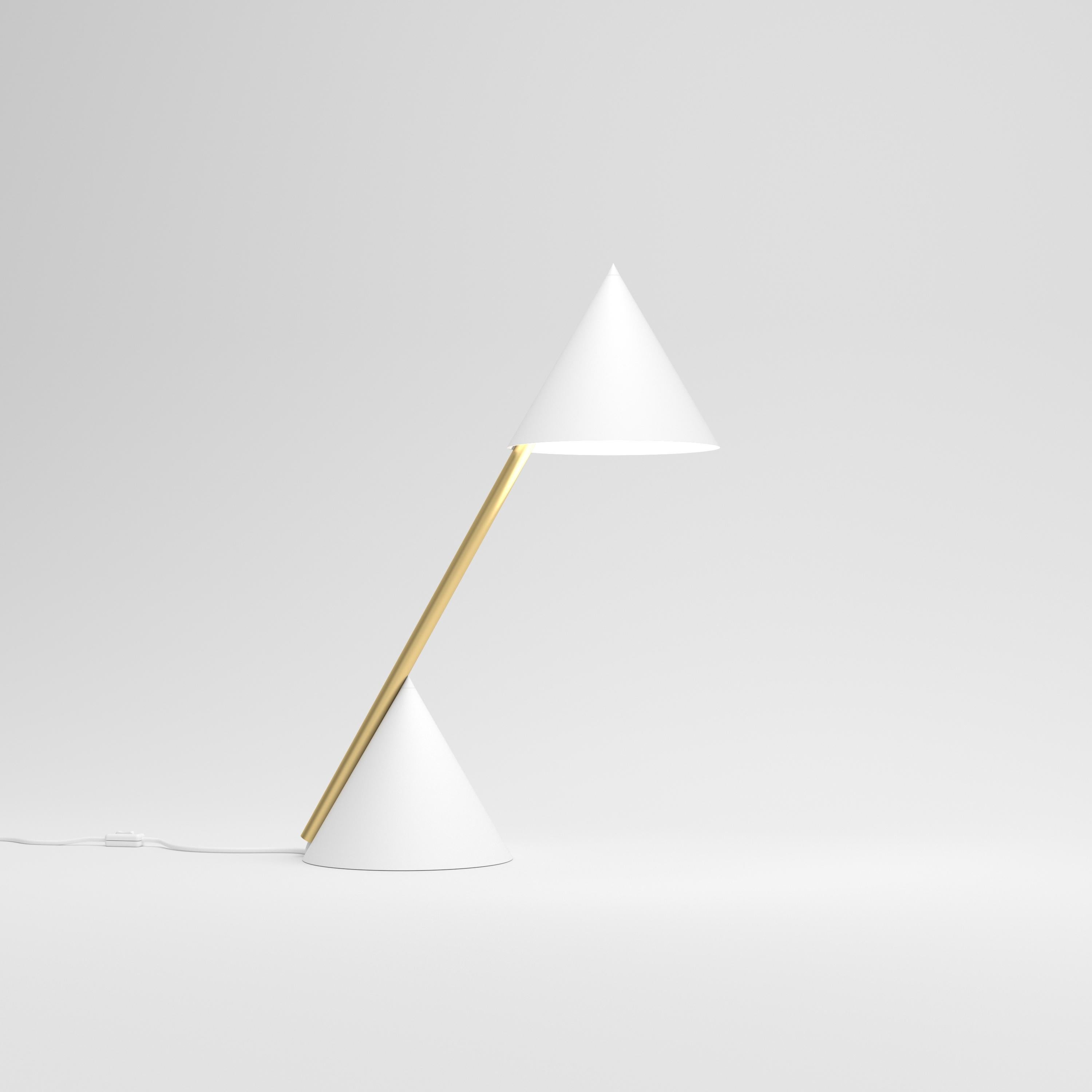 White Hat Desk Light by Atelier Areti
Dimensions: D 19 x W 33 x H 45 cm.
Materials: Brushed brass, powder-coated metal.

Available in brass or nickel.
Available in brass or white reflector.
Available in black, white, or color cones. Please contact