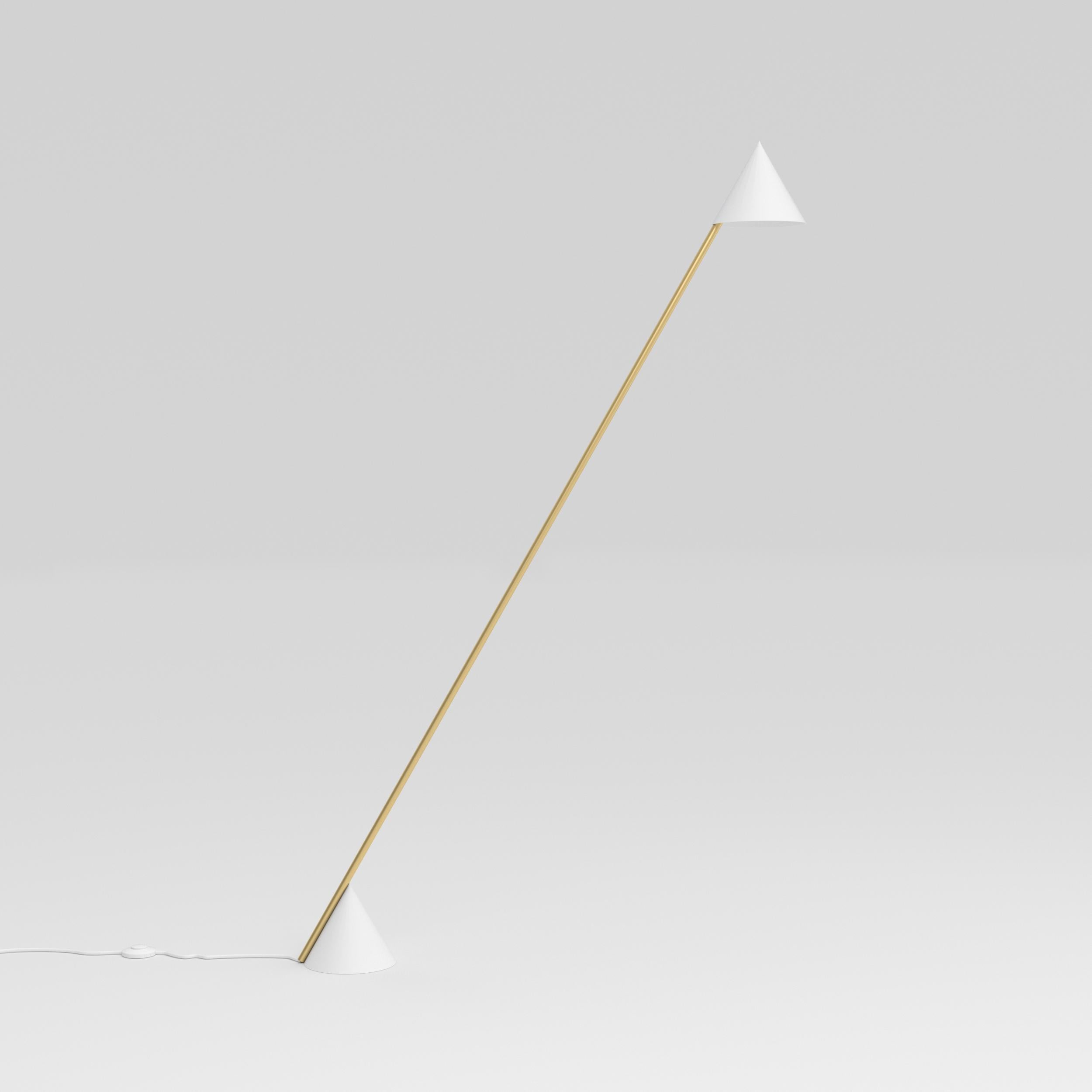 White Hat Floor Light by Atelier Areti
Dimensions: D 18 x W 90 x H 139.5 cm.
Materials: Brushed brass, powder-coated metal.

Available in brass or nickel.
Available in brass or white reflector.
Available in black, white, or color cones. Please