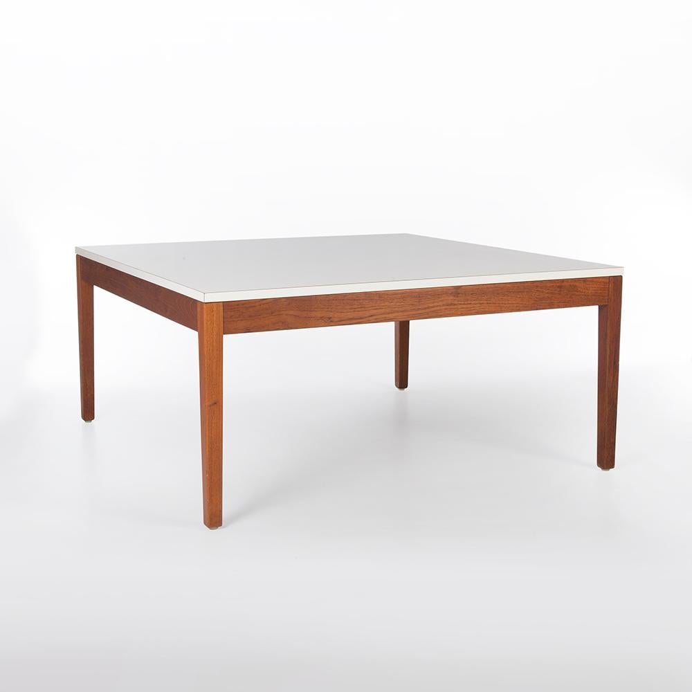 An iconic coffee table. This is an original vintage white laminate and wood Herman Miller 5752 Square coffee table by George Nelson. With its white laminated square top, this easy to clean, classy coffee table is in great vintage condition.