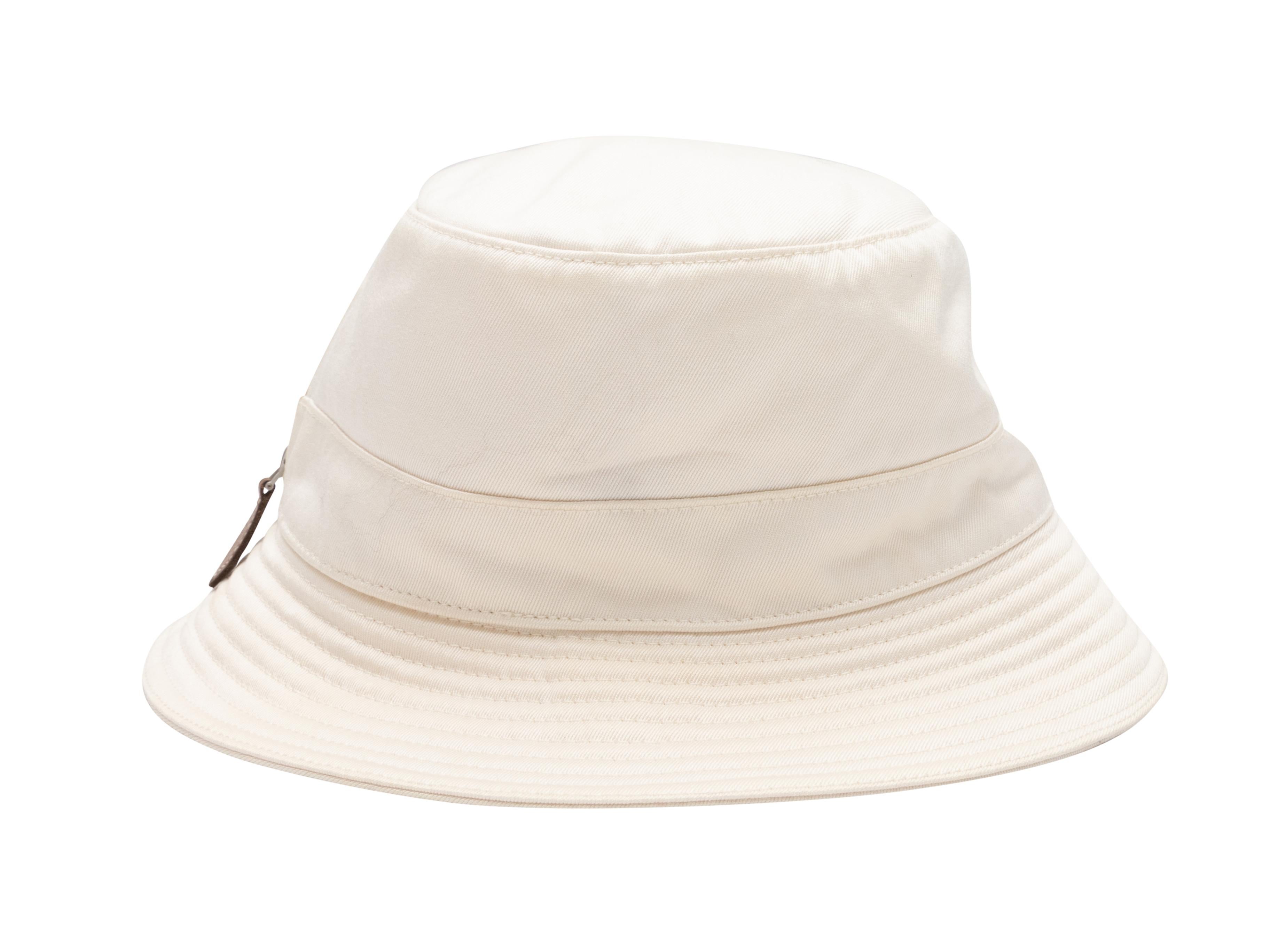White zipper bucket hat by Hermes. 7