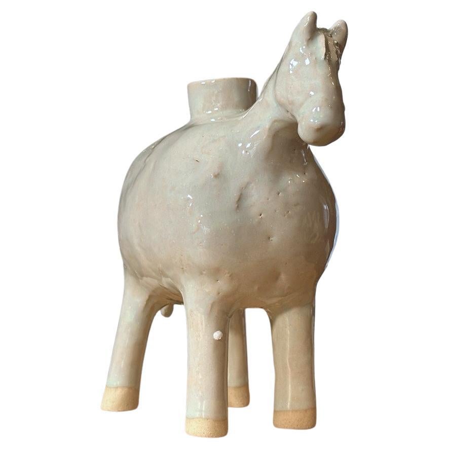 JESSE FALES, White Horse Vase, white stoneware and glaze, 2024. This handcrafted vase or candleholder pot channels the simplicity, strength, and purity of the white horse. Handmade in Yellowstone area.  Handmade; Each piece is unique Contemporary