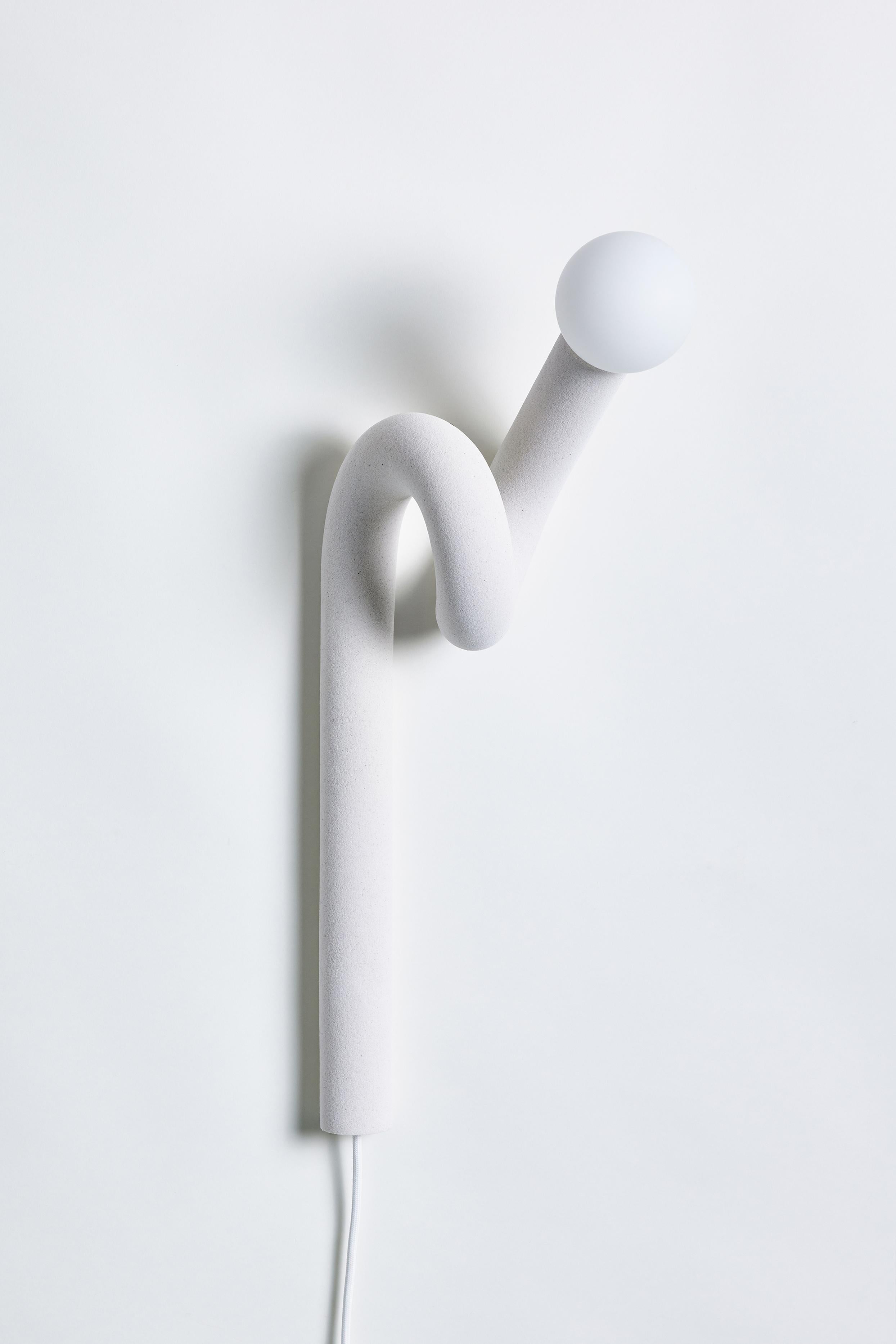 White Hotel Light 11 Wall Light by Hot Wire Extensions
Dimensions: D 30 x W 34 x H 197 cm 
Materials: Waste nylon powder, locally sourced natural white marble sand, copper pipe, hand-blown glass bulb, natural cotton electrical.
3 kg

Also available