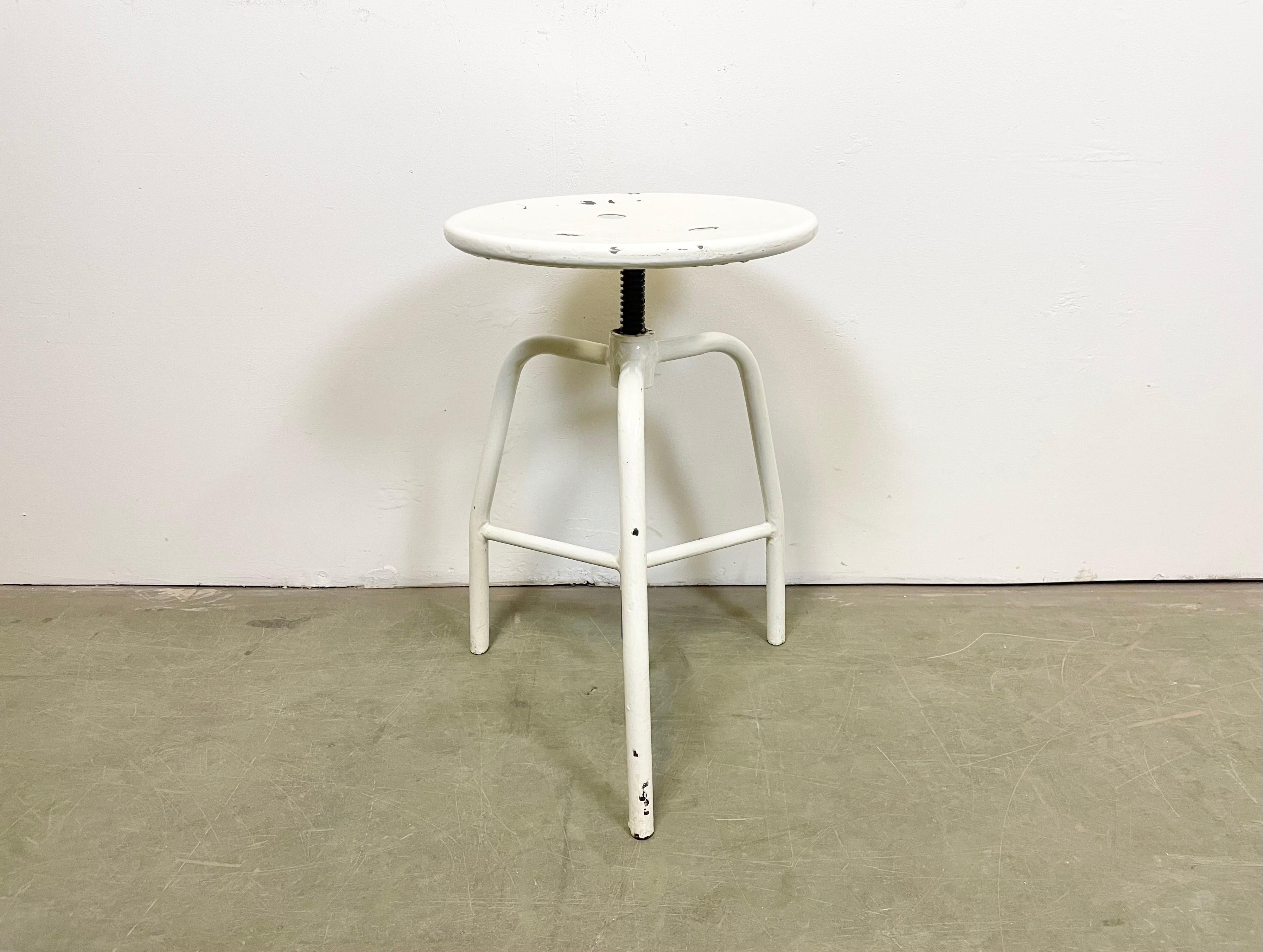 Industrial three-legged height adjustable medical stool made in Poland during the 1960s.
Min.- Max. seat height: 46 cm - 65 cm.
Seat diameter: 35 cm.
Weight: 5 kg.