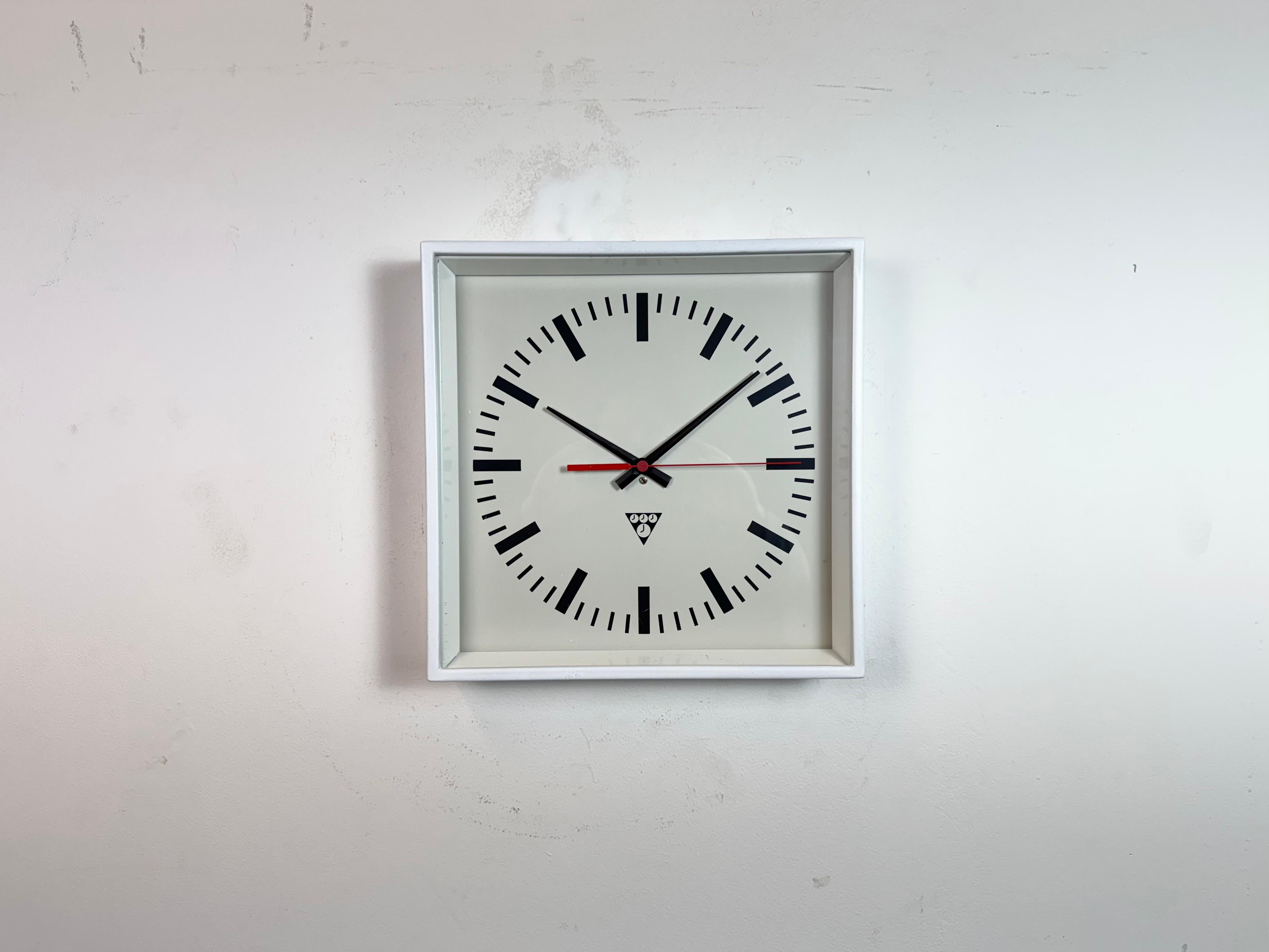 - Wall clock designed by Pragotron in former Czechoslovakia during the 1970s and made till 1990s
- Was used in factories, schools and railway stations 
- White painted metal frame
- Aluminium dial and hands 
- Clear glass cover 
- Former electric
