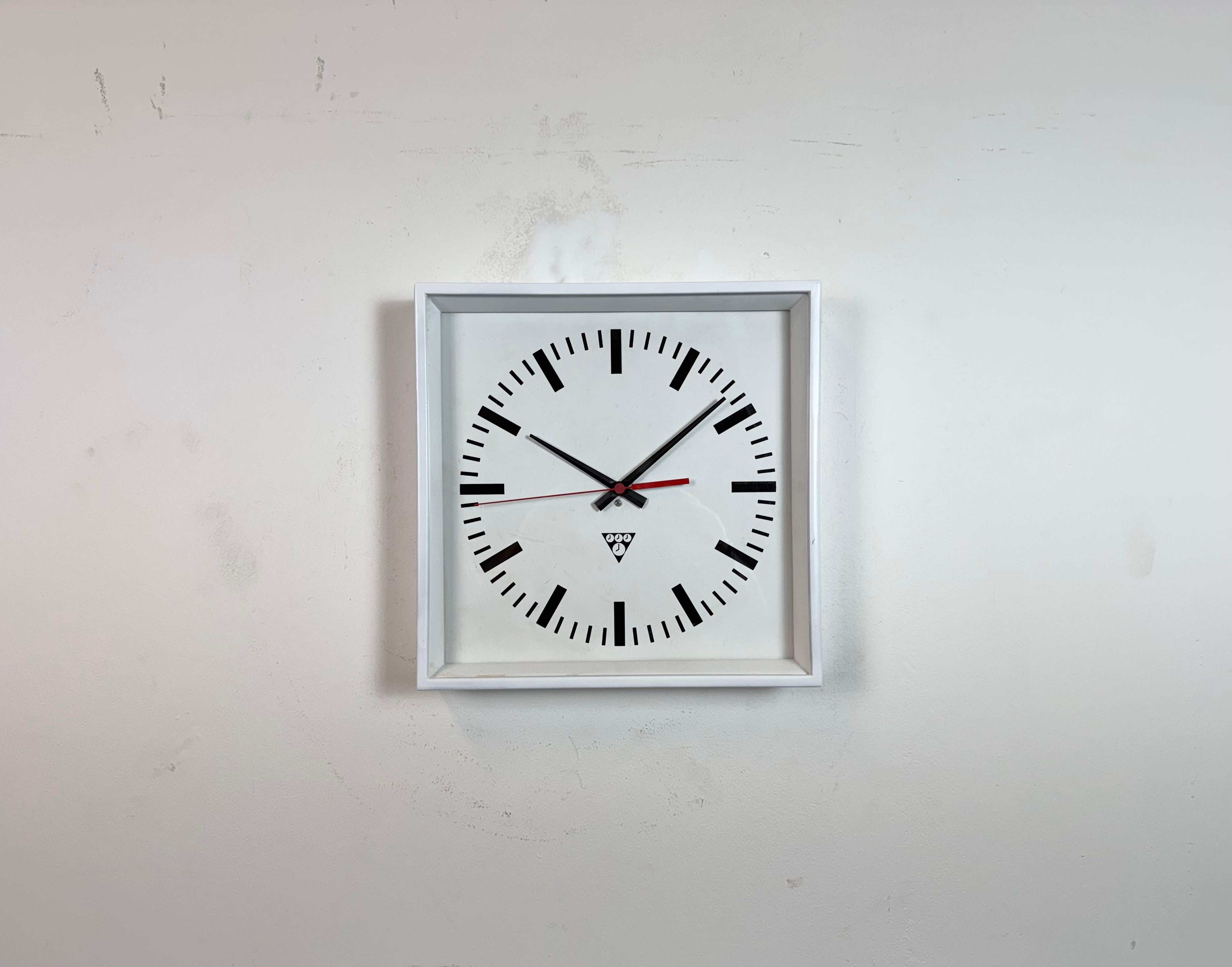 - Wall clock designed by Pragotron in former Czechoslovakia during the 1970s and made till 1990s
- Was used in factories, schools and railway stations 
- White painted metal frame
- Aluminium dial and hands 
- Clear glass cover 
- Former electric