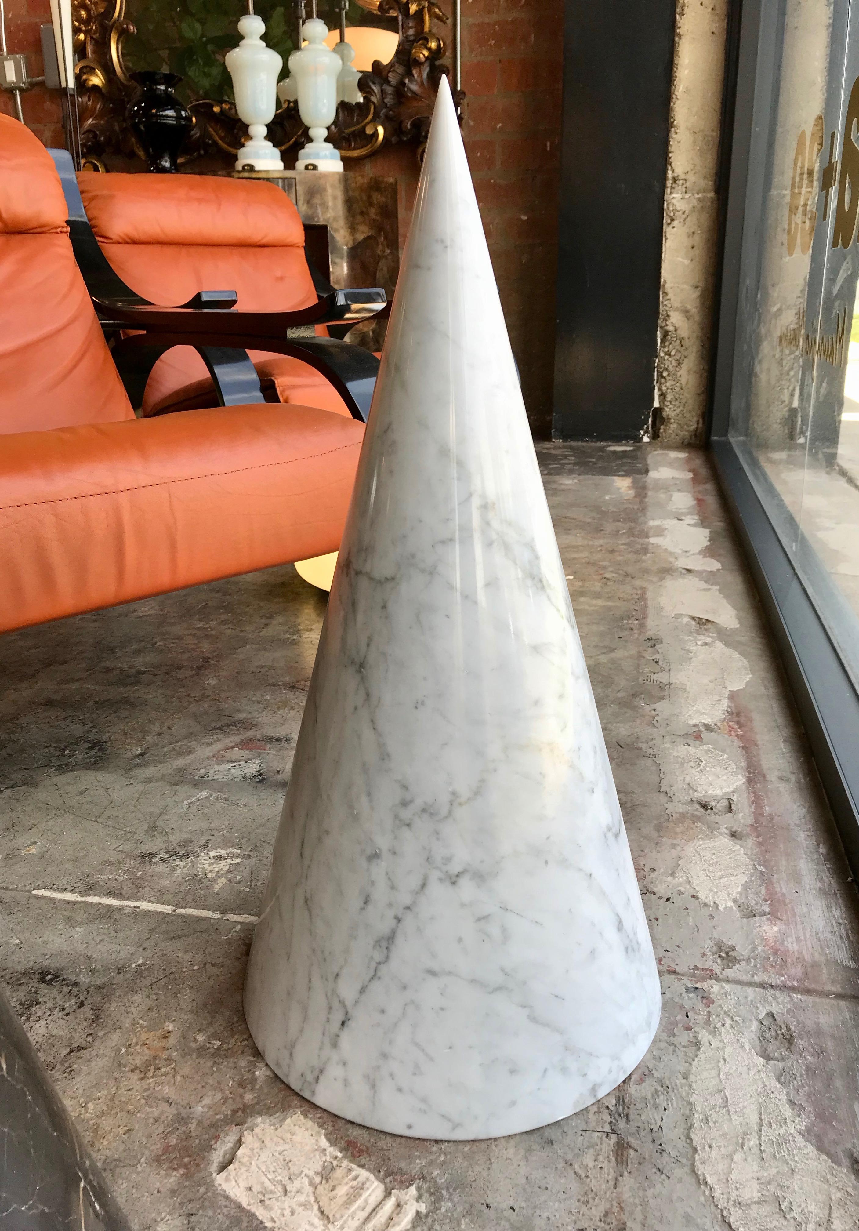 The design is architectural in the sense that the construction is monumental and solid.
The white cone is minimal and powerful at the same time.
Perfect for in-out door decoration.
Italian Carrara marble.