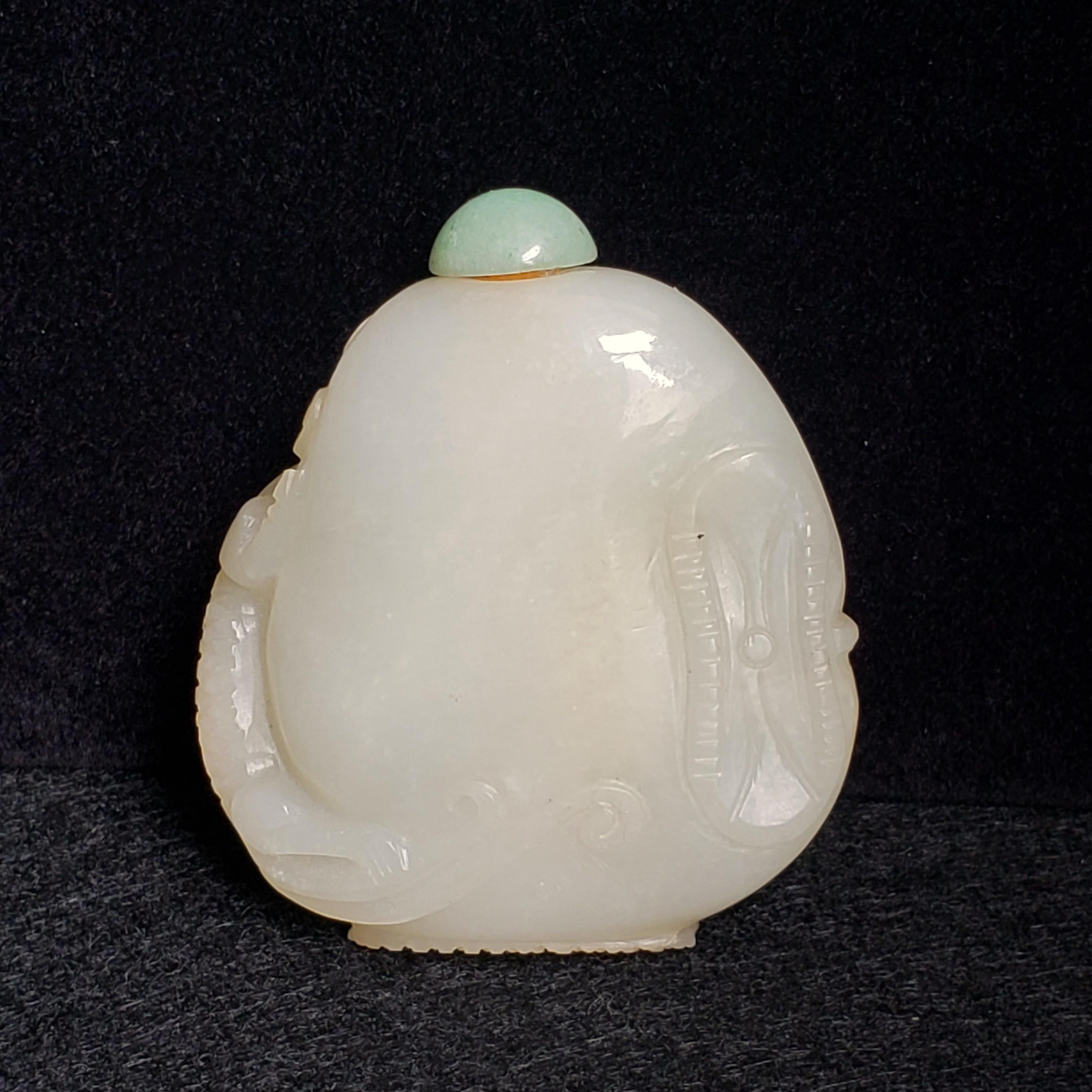 Artisan White Jade Snuff Bottle with Chilong & Lotus Motif, Green Jadeite Cap For Sale