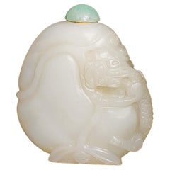 White Jade Snuff Bottle with Chilong & Lotus Motif, Green Jadeite Cap