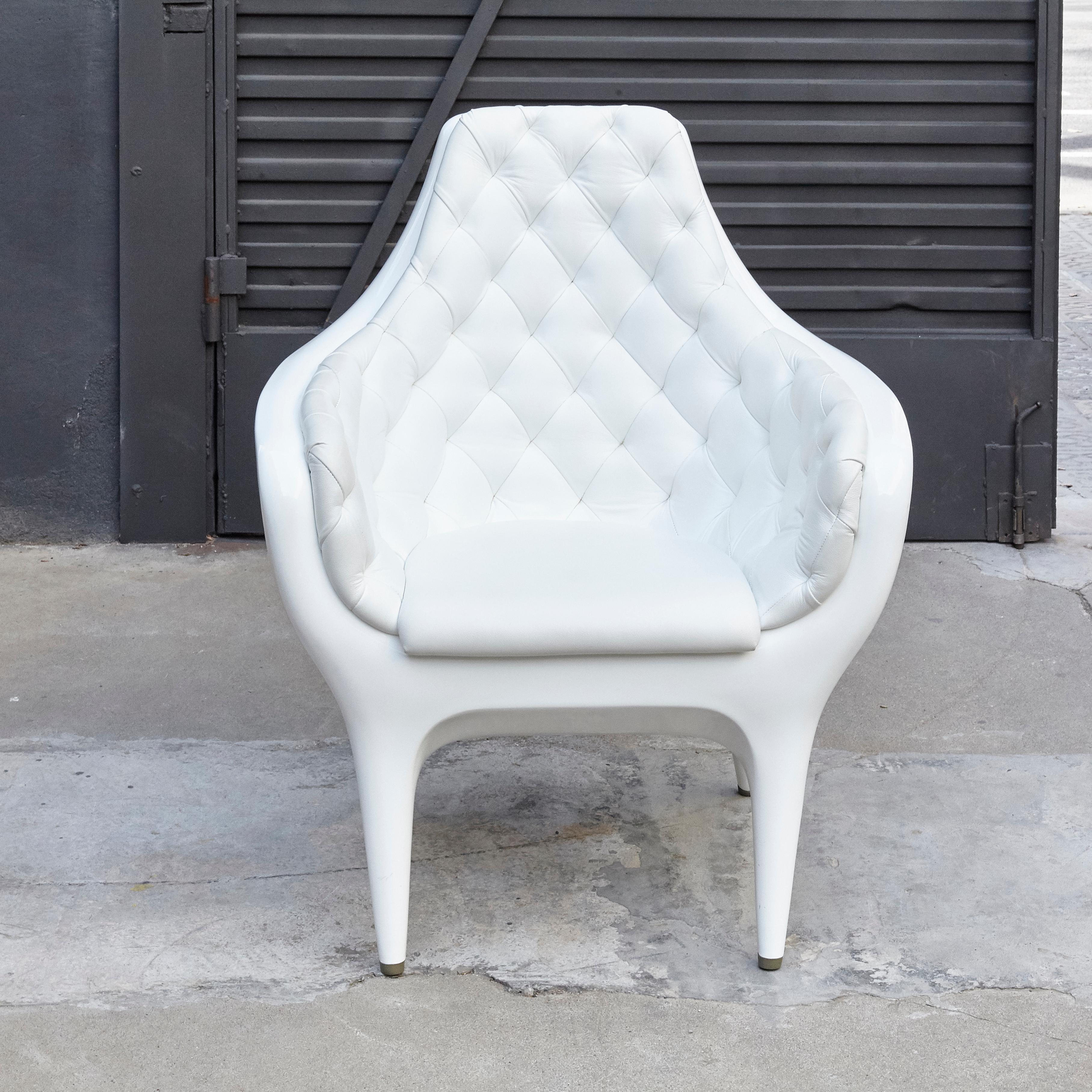 Armchair designed by Jaime Hayon produced by BD

Structure in high gloss lacquered rotomoulded polyethylene. Upholstered in leather caption.

Has some wear consistent of age and use.