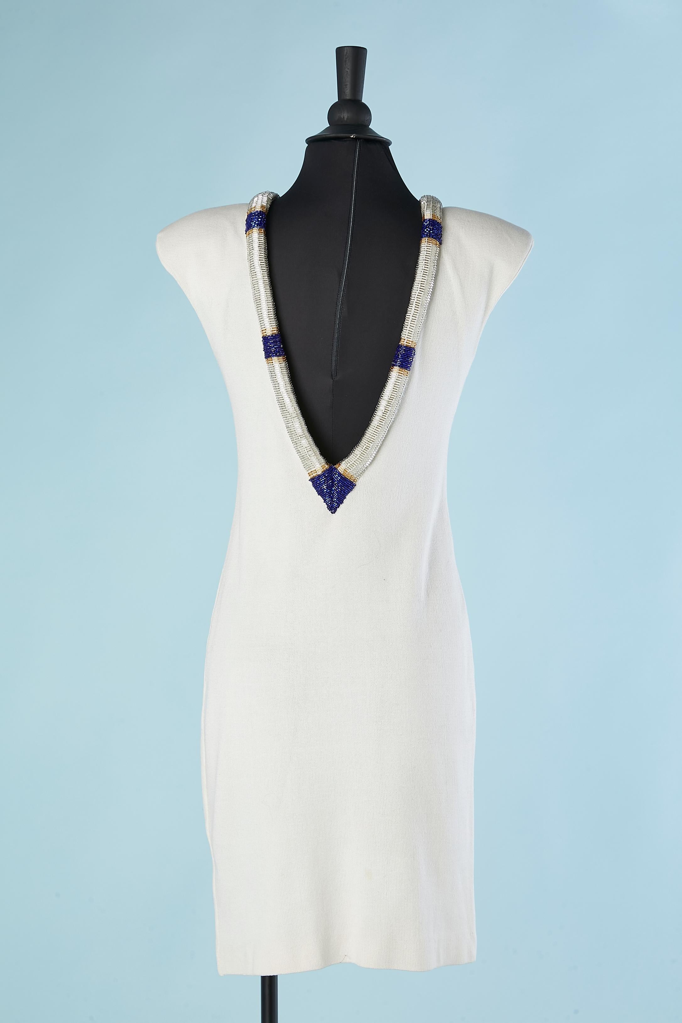 Women's White jersey cocktail dress with beaded neckline edge and back Circa 1980's  For Sale