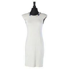 White jersey cocktail dress with beaded neckline edge and back Circa 1980's 