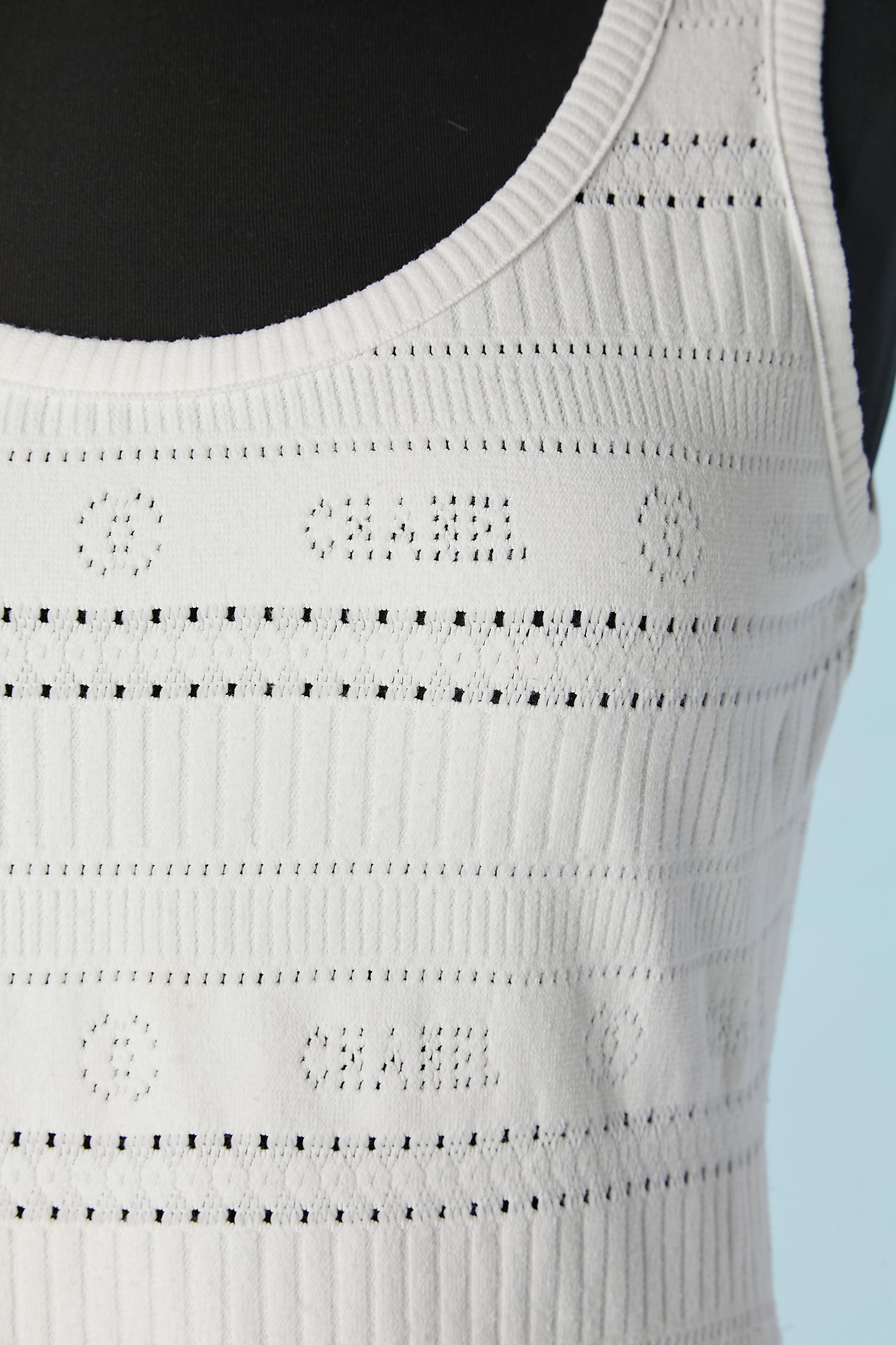 White jersey jacquard tank top . Fabric composition: 92% polyamide, 8% spandex
SIZE 44 but fit M 