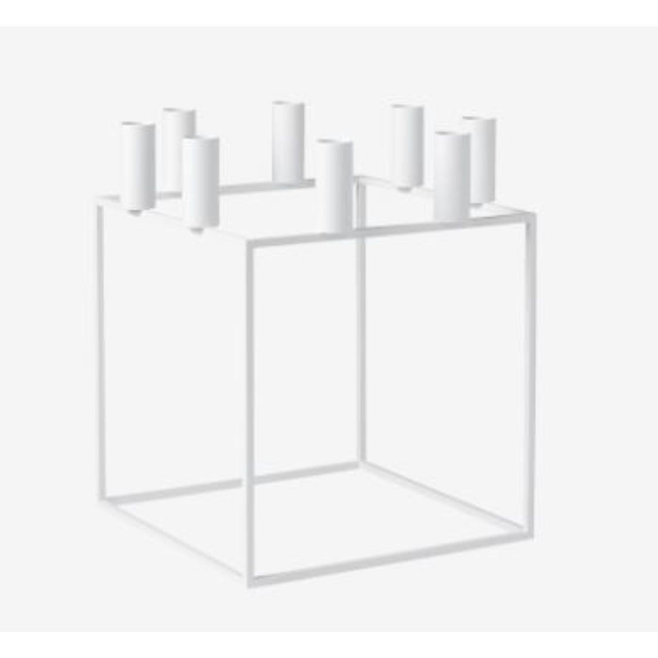 White Kubus 8 candle holder by Lassen
Dimensions: D 23 x W 23 x H 29 cm 
Materials: Metal 
Also available in different dimensions.
Weight: 1.50 Kg

With a sharp sense of contemporary Functionalist style, Mogens Lassen designed the iconic Kubus