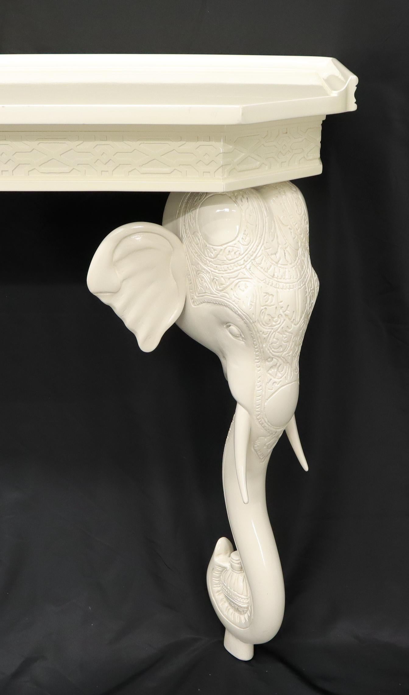 Decorative Mid-Century Modern white lacquer carved elephants wall console table.
