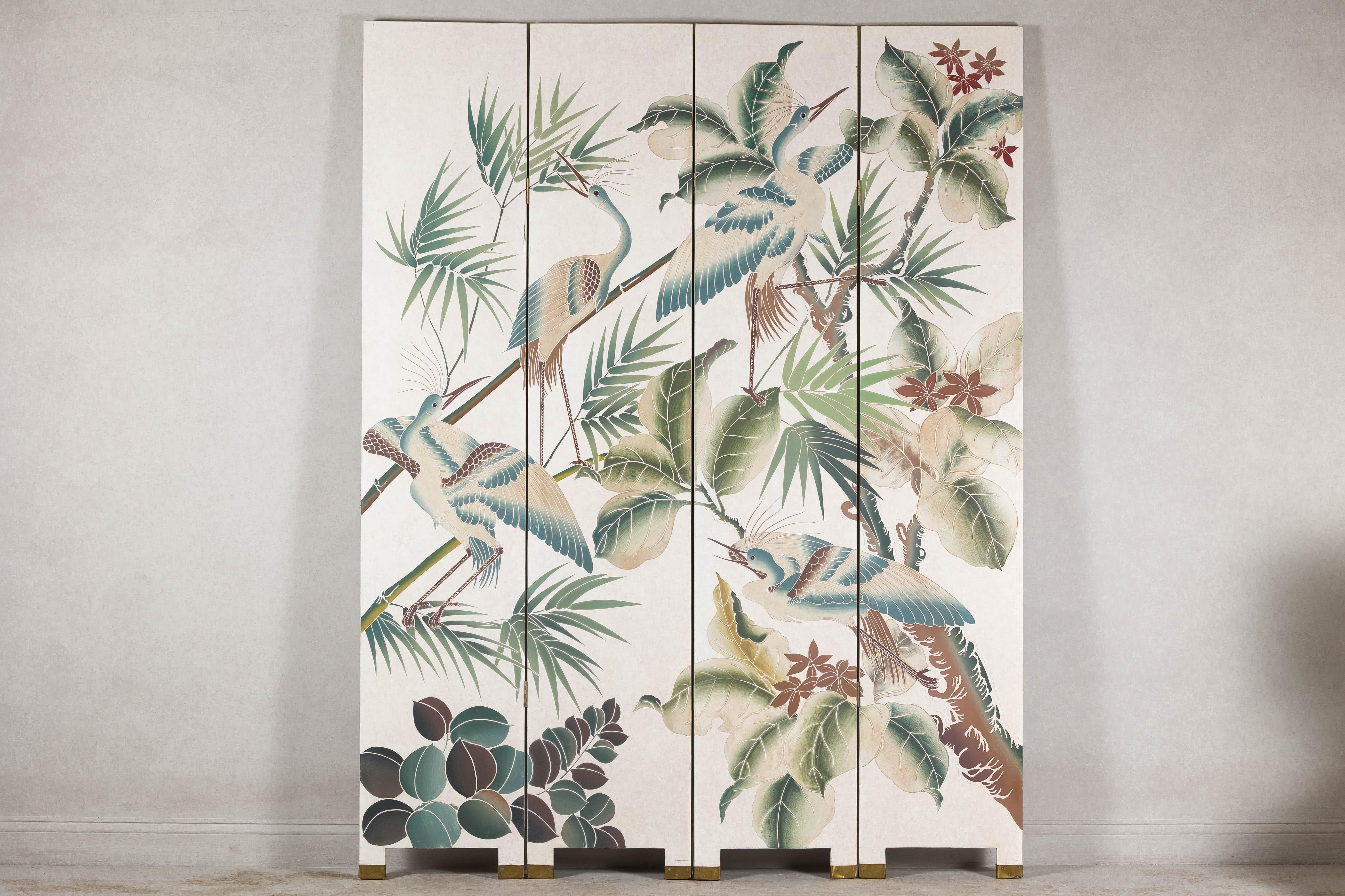 This four-panel lacquered screen transforms a space with its exquisite hand-painted composition of cranes and lush botanicals. The elegant white lacquer serves as a serene backdrop for the intricate scene, where cranes perch gracefully among