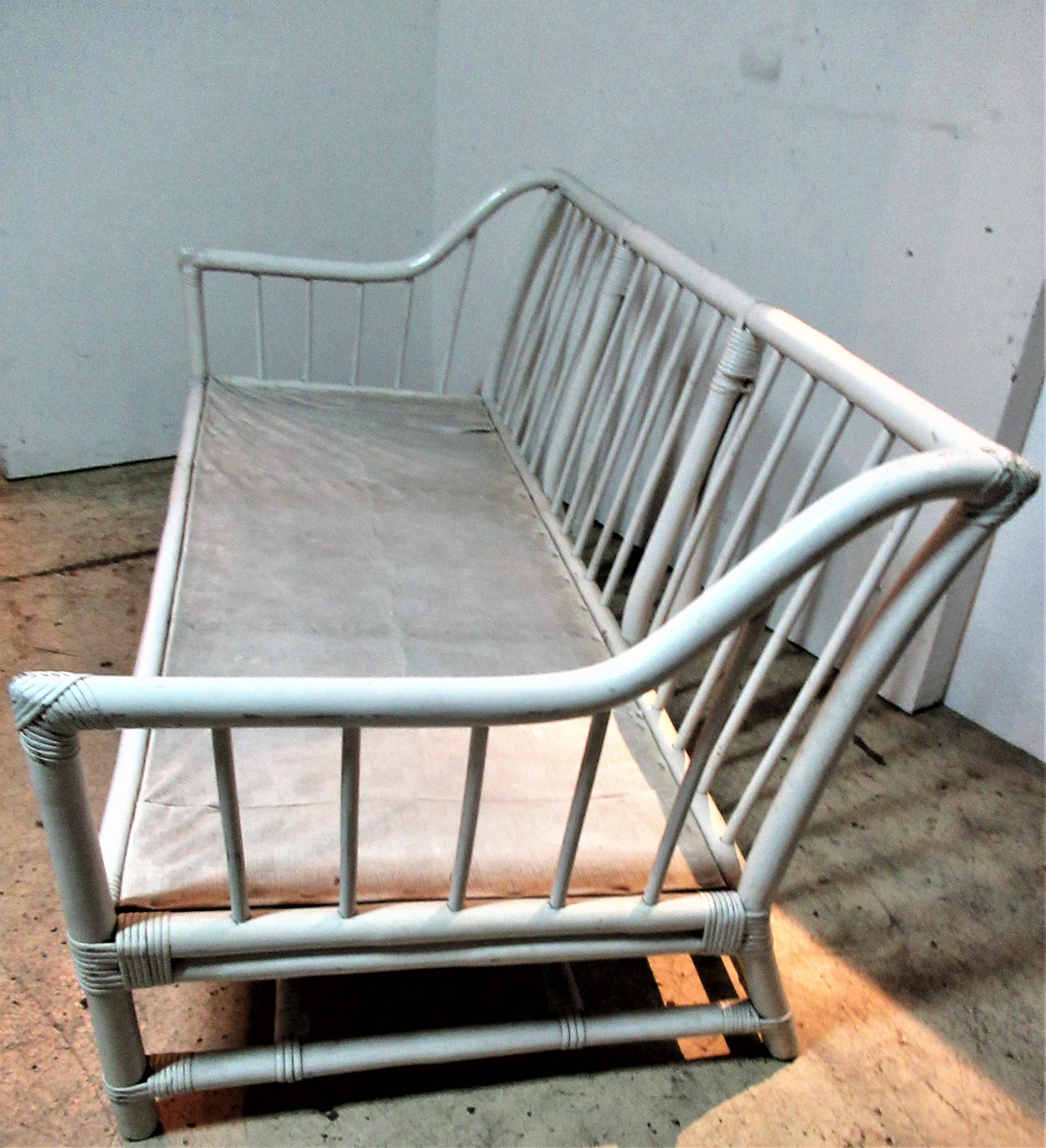 white bamboo sofa