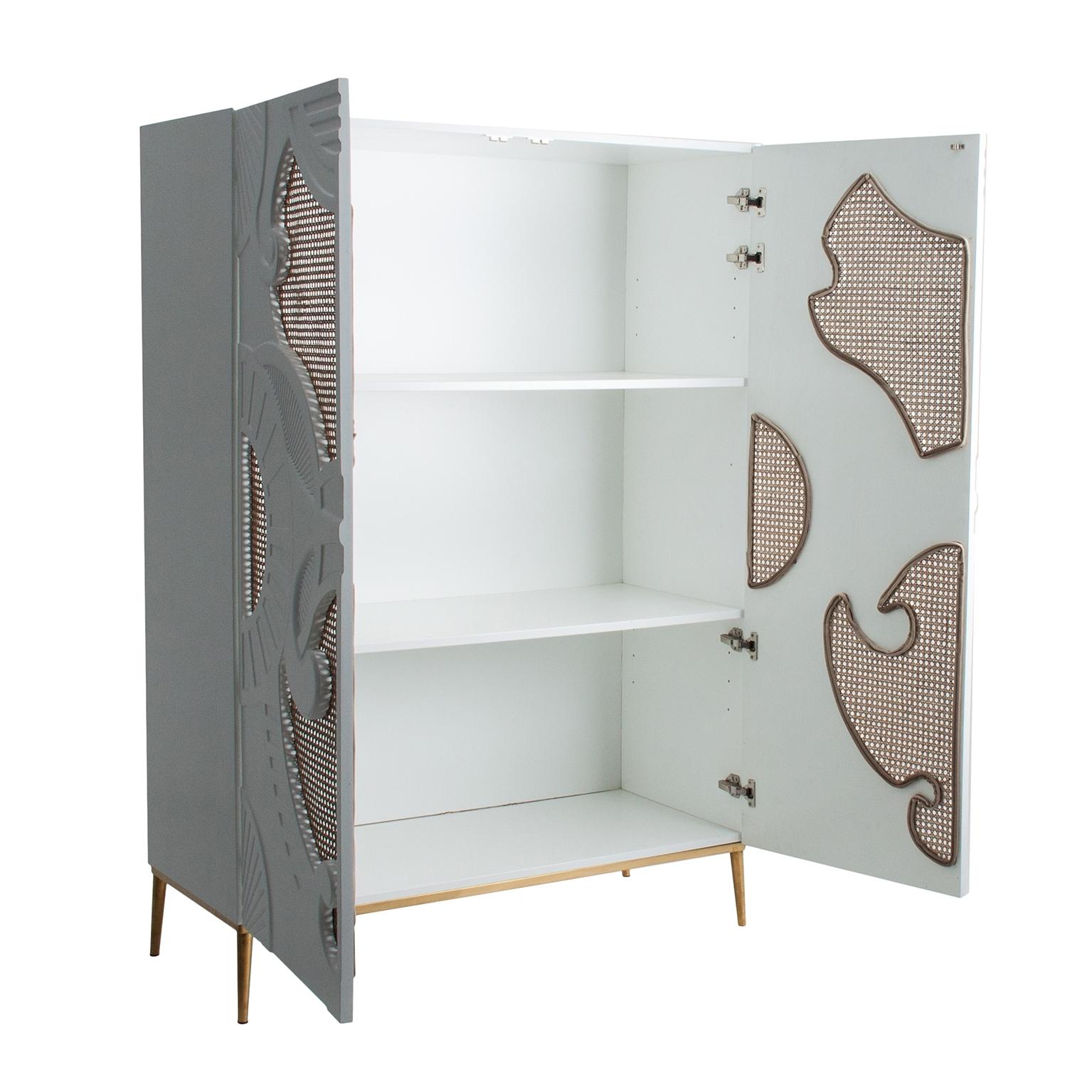 White lacquer wooden with woven cane and graphic panels doors cabinet.
