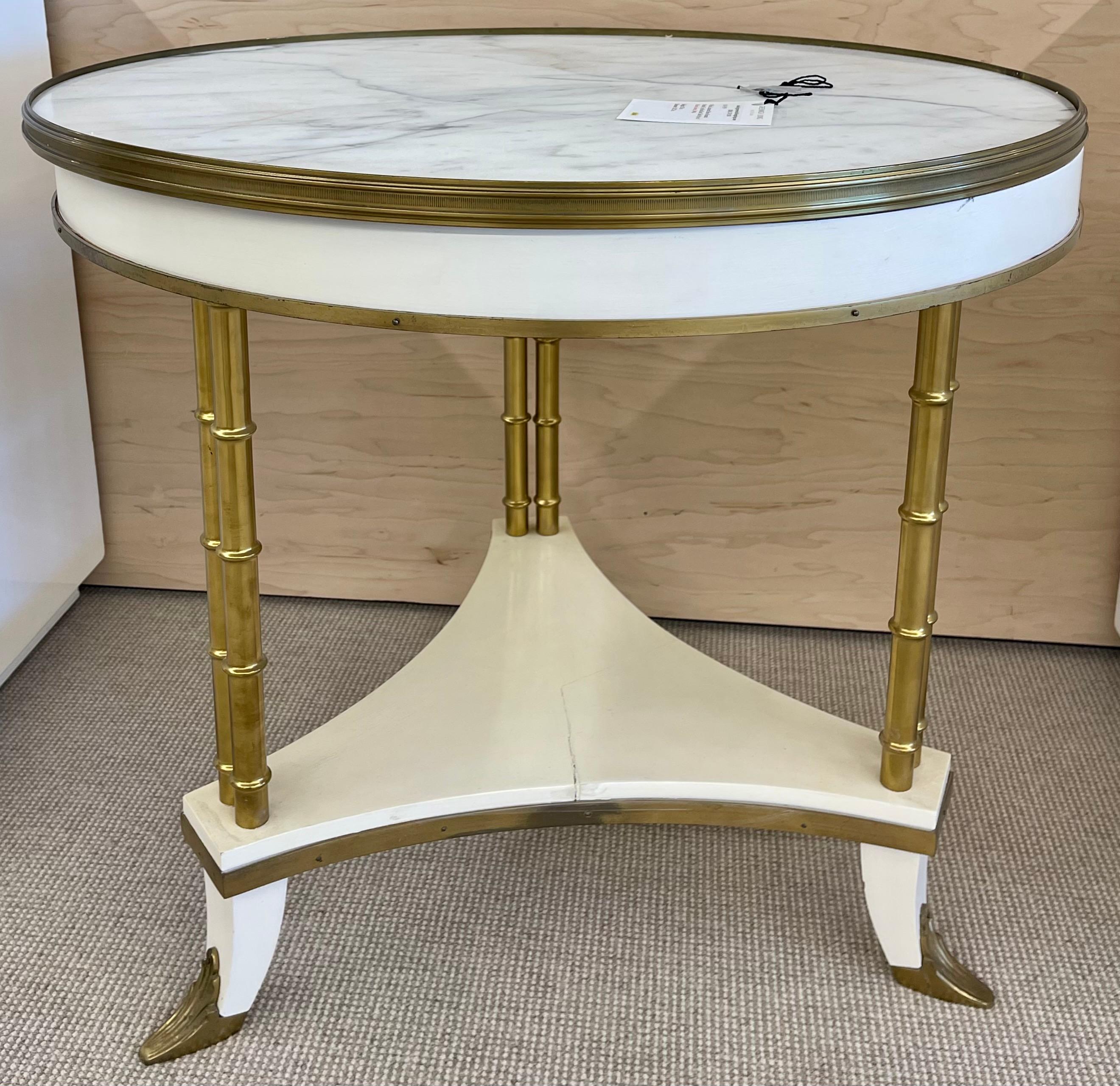 Fine white lacquered Hollywood Regency brass-mounted bouilliote, end or center table in the style of Maison Jansen. This spectacular center or end table is stunning having a bronze framed white and gray veined marble top with a bronze framed apron