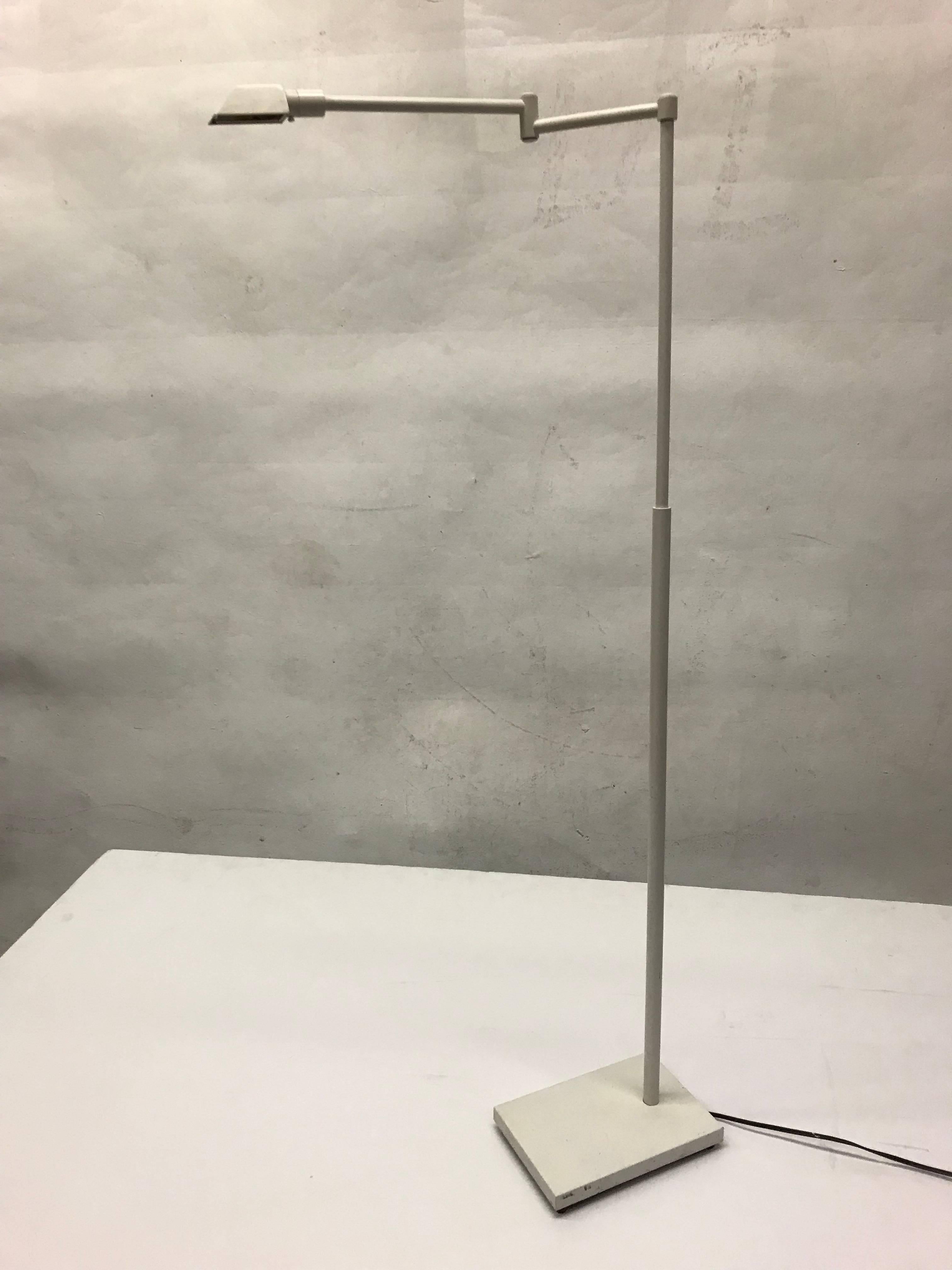 Floor lamp in white lacquered metal. Very narrow with small shade - shade itself measures 1 5/8