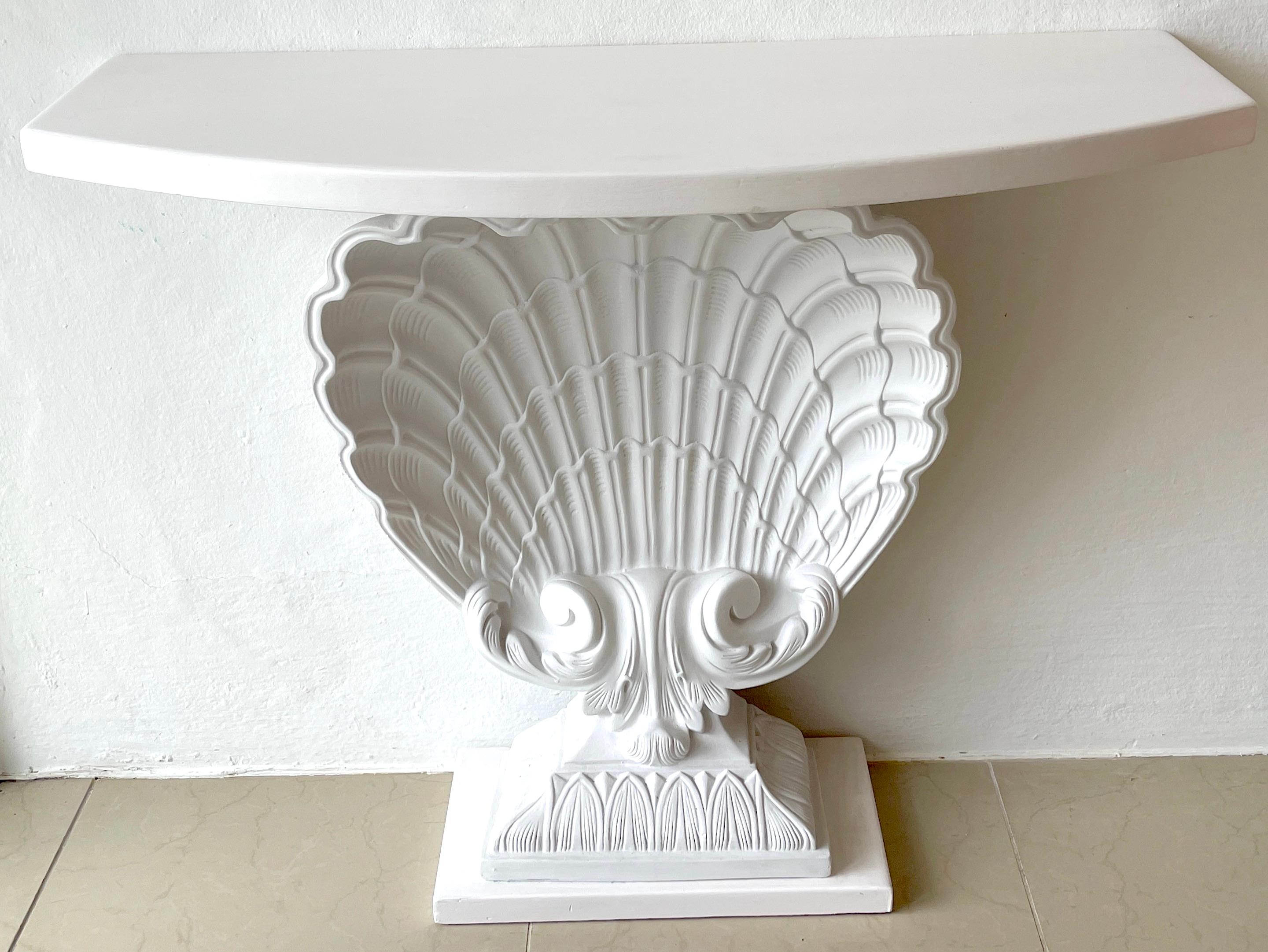 White lacquered shell console by Grosfeld House, restored
An exceptional period example with high relief carving, newly lacquered. 
Console measures 38