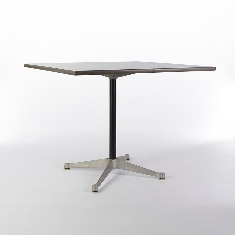 This is a great example of an original Herman Miller Eames white laminate square contract dining table in amazing condition considering it is from the 1960s! The subtly stylish design changed little except for the introduction of the 'Universal