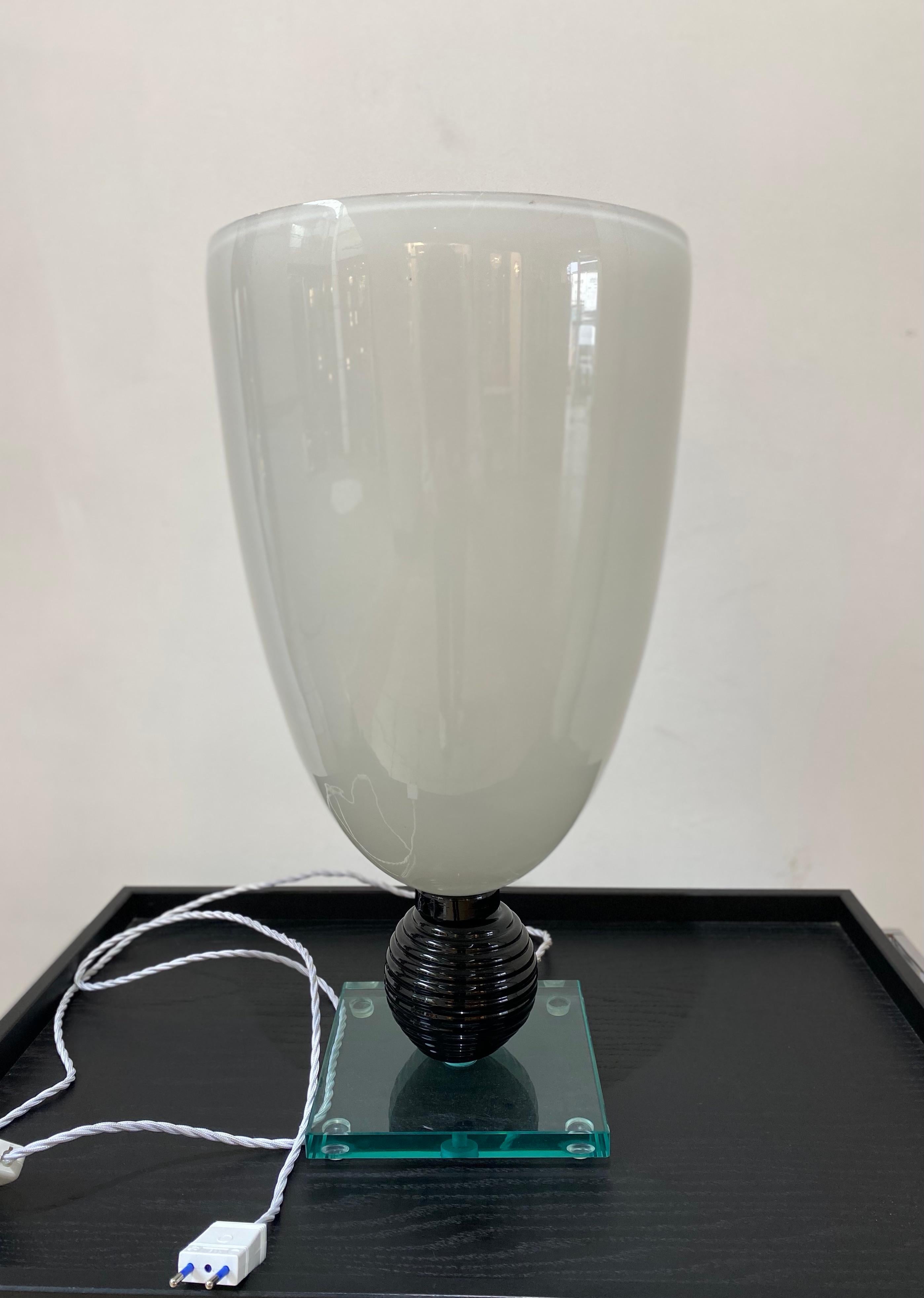 White lamp in Murano glass
Circa: 1980
Dimension : Height : 57 cm, diameter : 29,5 cm , 
EU plug
Ref : c 1894/15
Price : 1600€ for this lamp.