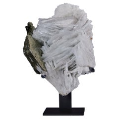 Formación de mica blanca reticulada y cleavelandita