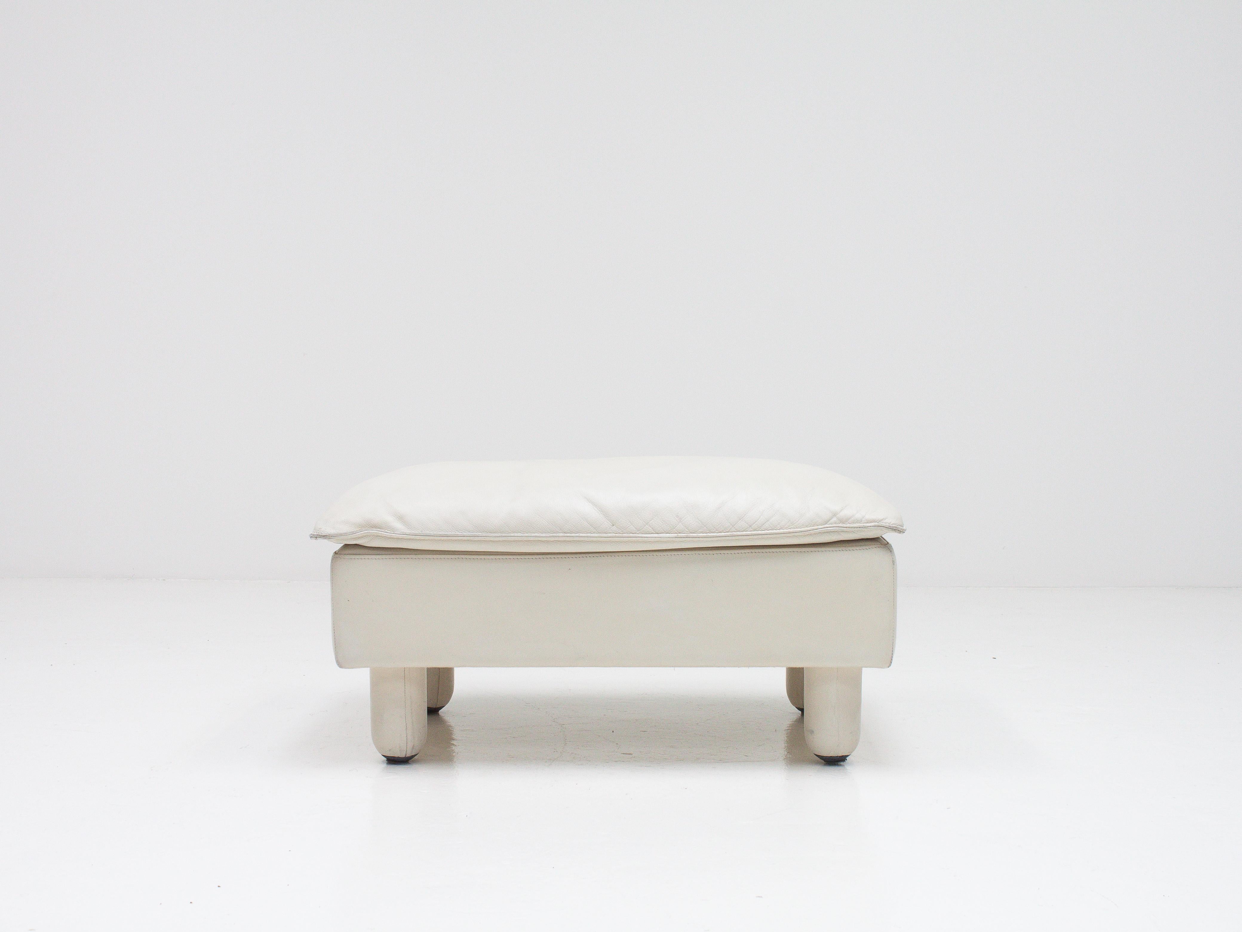 white leather footstool
