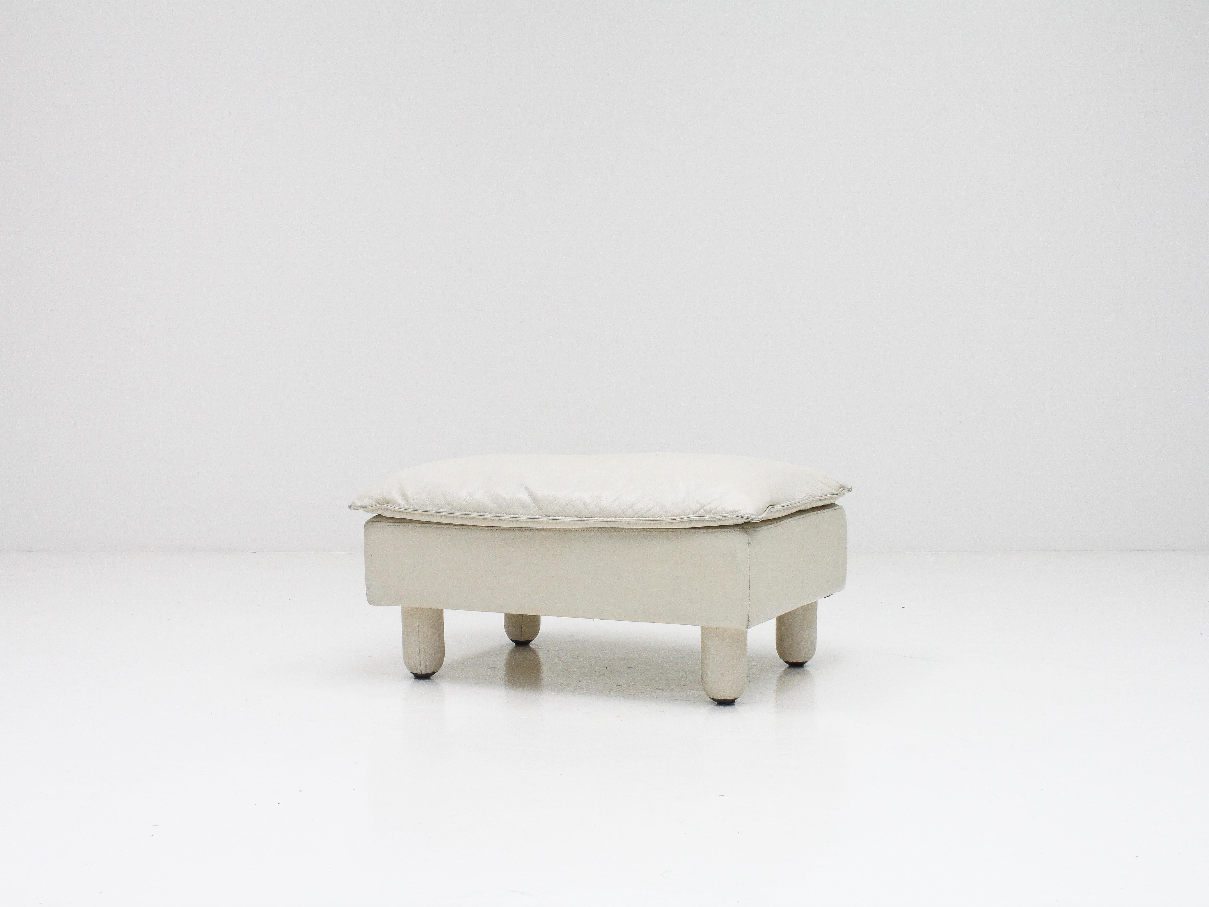 white leather footstools