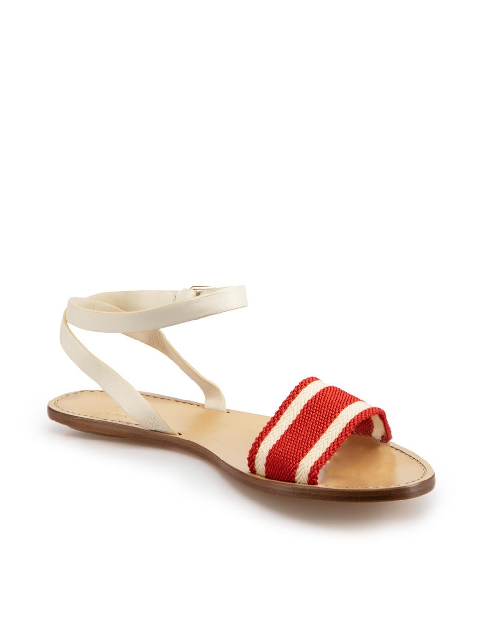 CONDITION is Very good. Minimal wear to sandals is evident. Minimal discoloured marks to inner sole and straps on this used Gucci designer resale item. Dustbag included.



Details


Red and white

Canvas

Flat strappy sandals

Striped