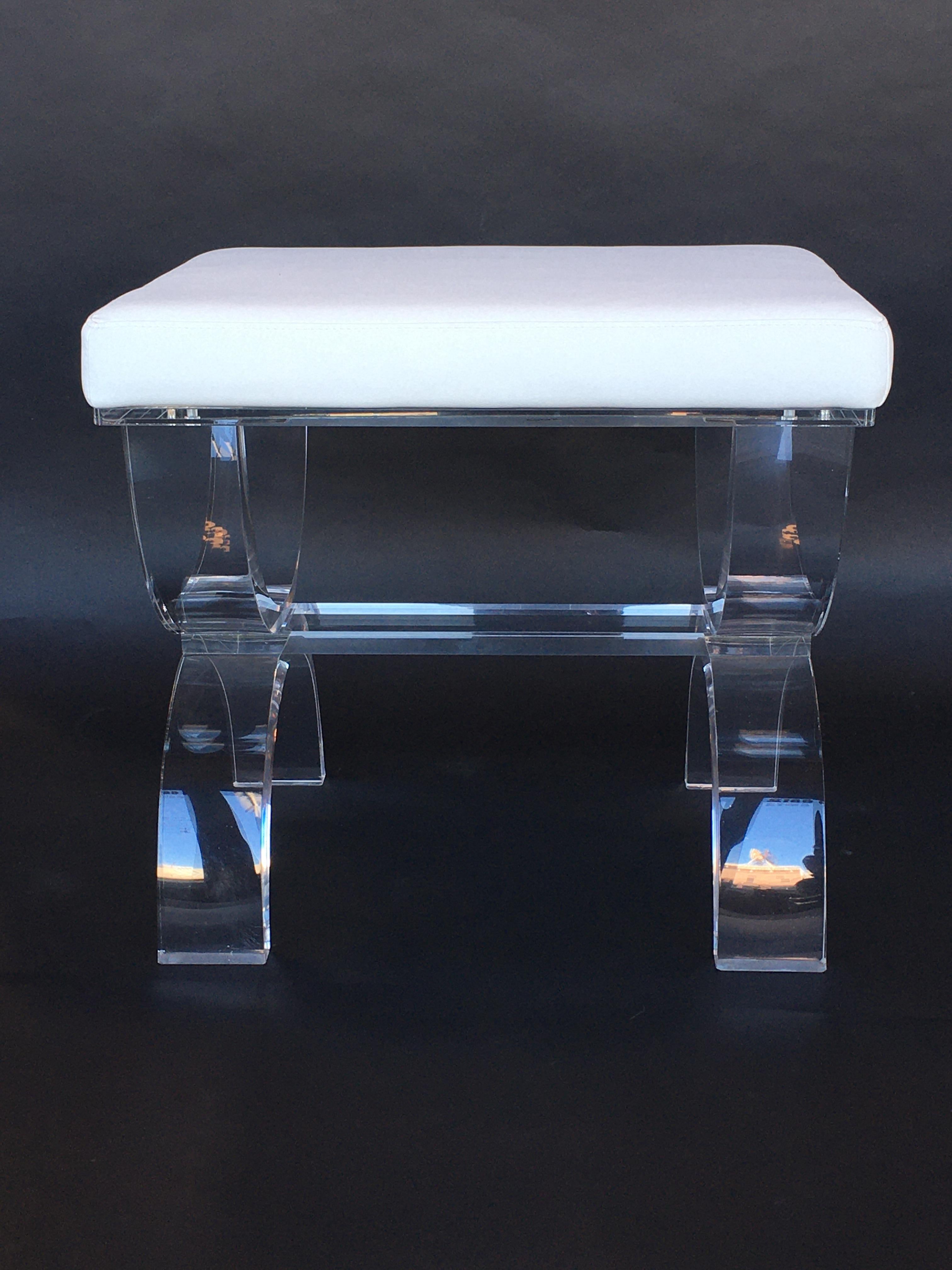Art Deco style white leather stool with Lucite legs.