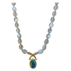White Lentil Moonstone Necklace with an 18k Yellow Gold Black Opal Clasp