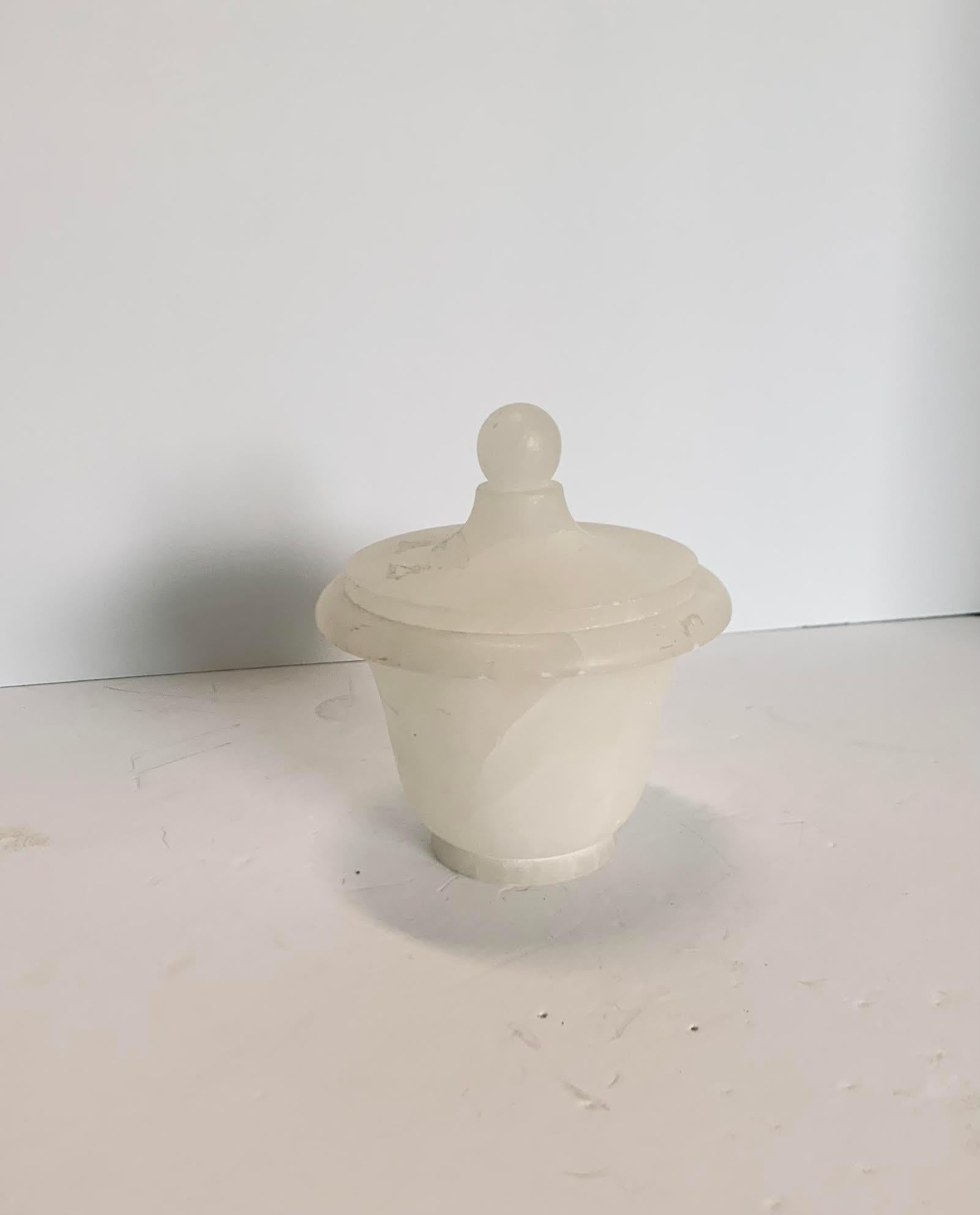 Mid century Italian lidded alabaster jar.
Can be combined with others to make a gradated set.
(S5877 thru S5882).