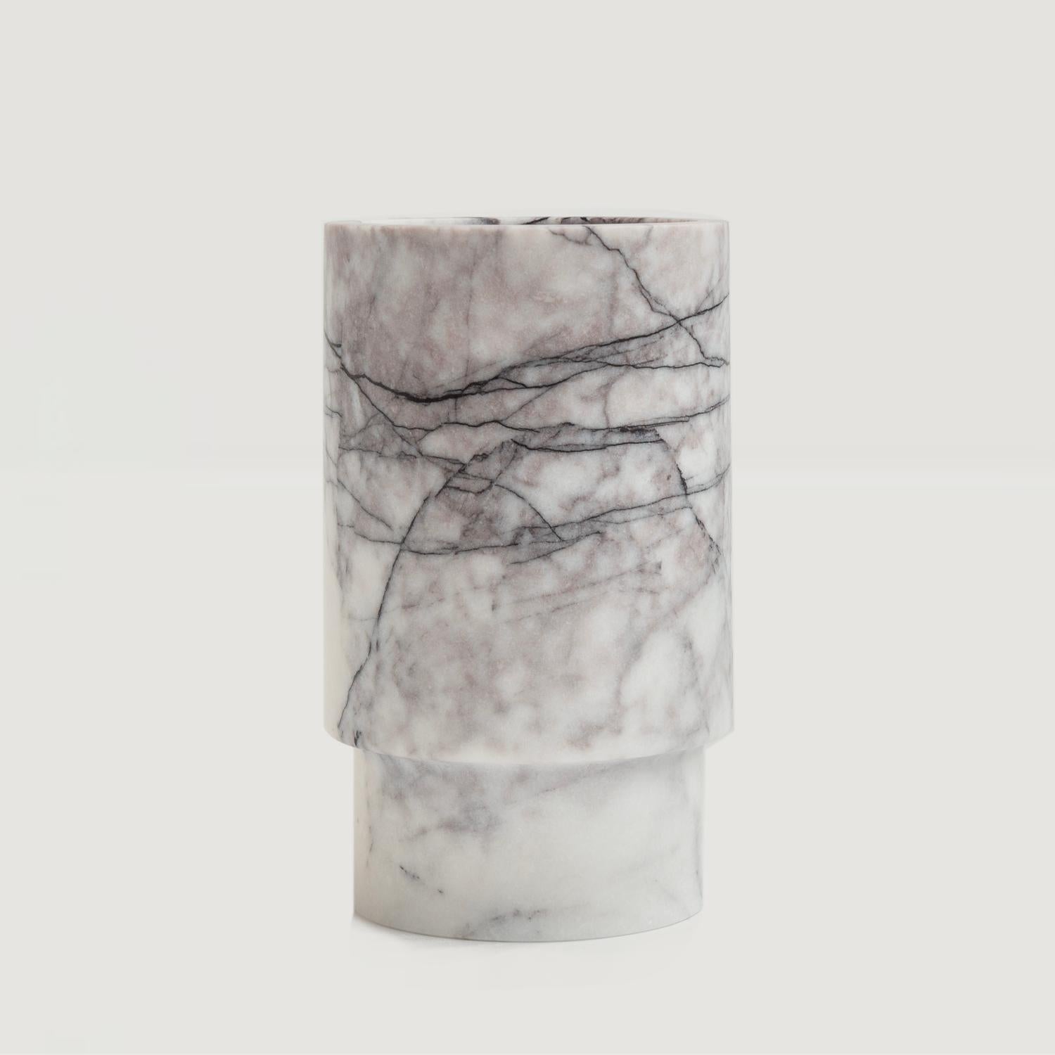 Crafted from a natural marble, this vase will be sure to win your heart. It can be used to hold your wine bottle, blooms, kitchen utensils and so much more. Place it in amongst your decor objects for a truly outstanding textural ornament.

Overall