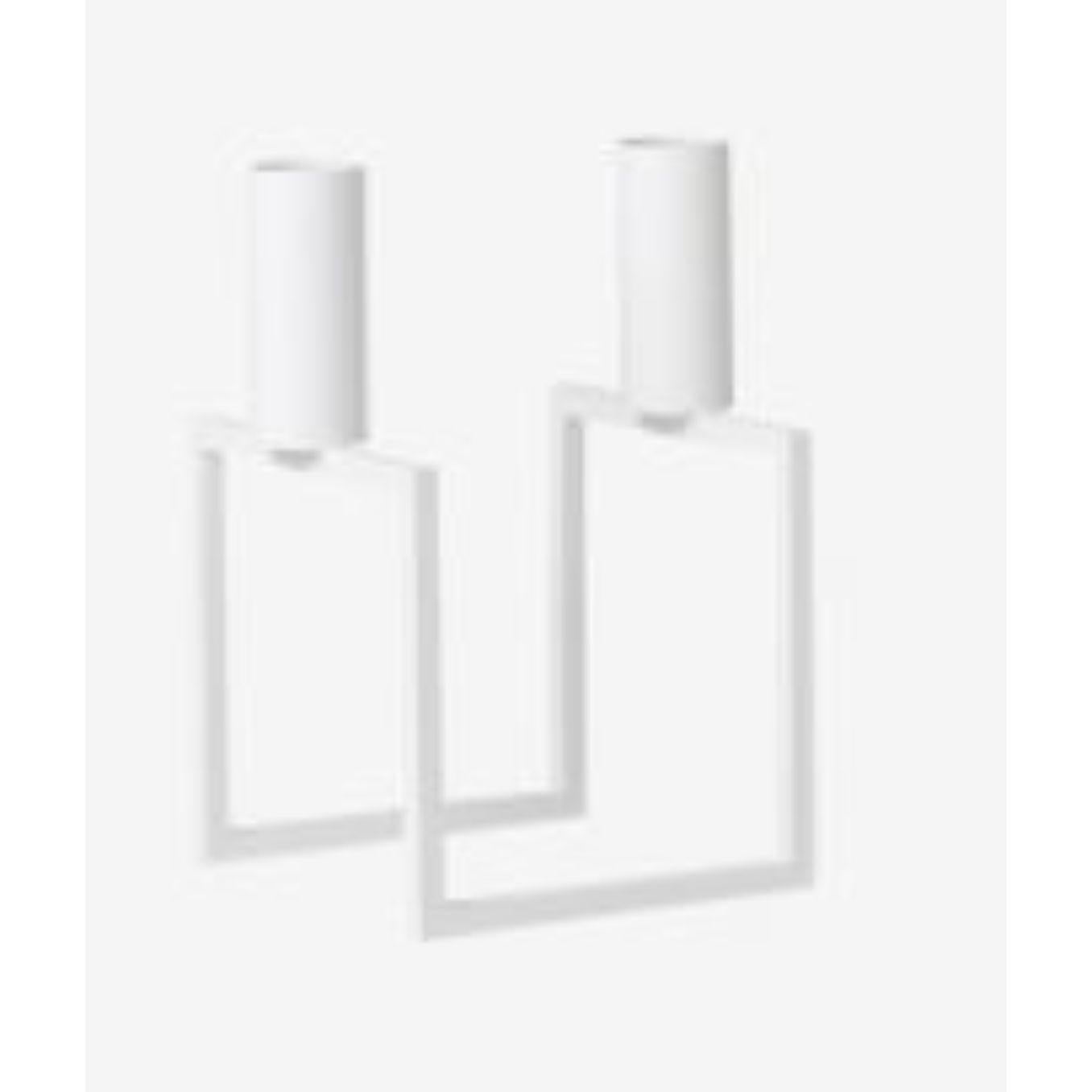 White line candle holder by Lassen
Dimensions: D 10 x W 10 x H 16 cm 
Materials: Metal 
Also available in different dimensions. 
Weight: 0.60 Kg

With a sharp sense of contemporary Functionalist style, Mogens Lassen designed the iconic Kubus