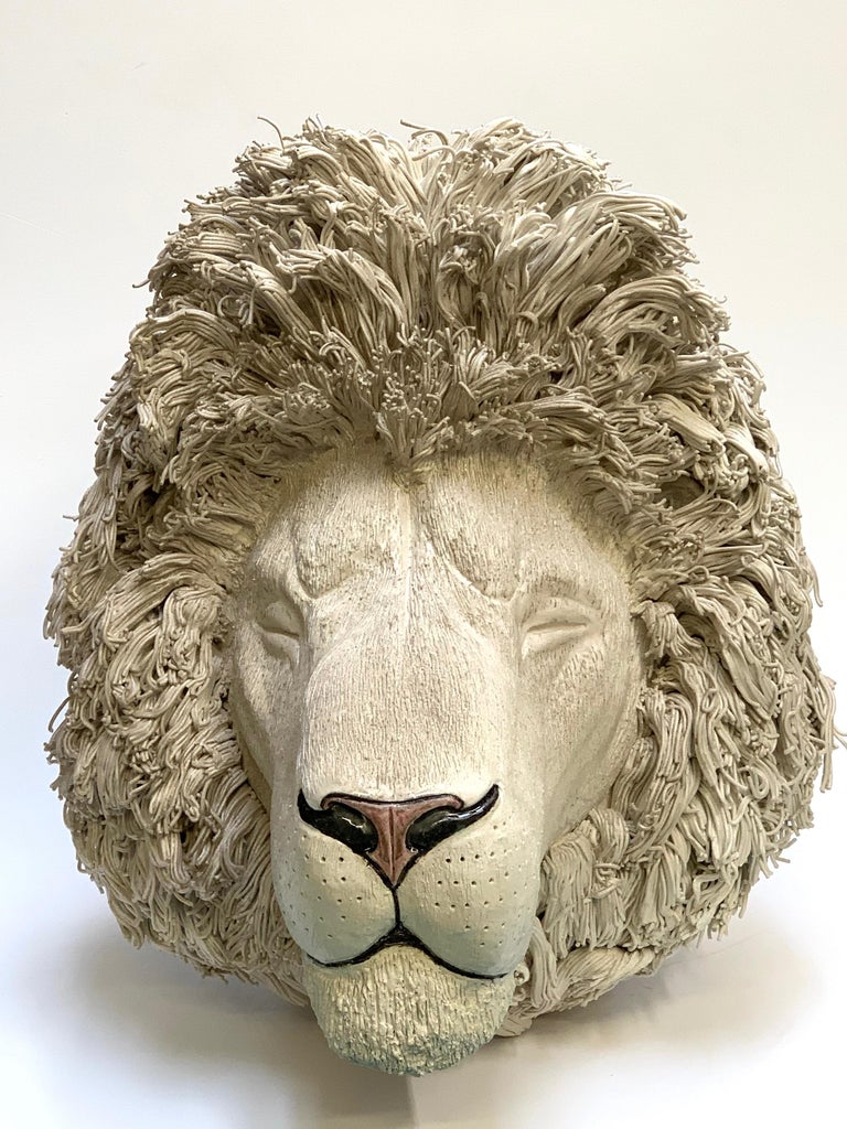 The piece is a unique representation of a Lion in a modern way. The animal is gently painted with a cream colour.
Our designer creates these pieces completely by hand.
  