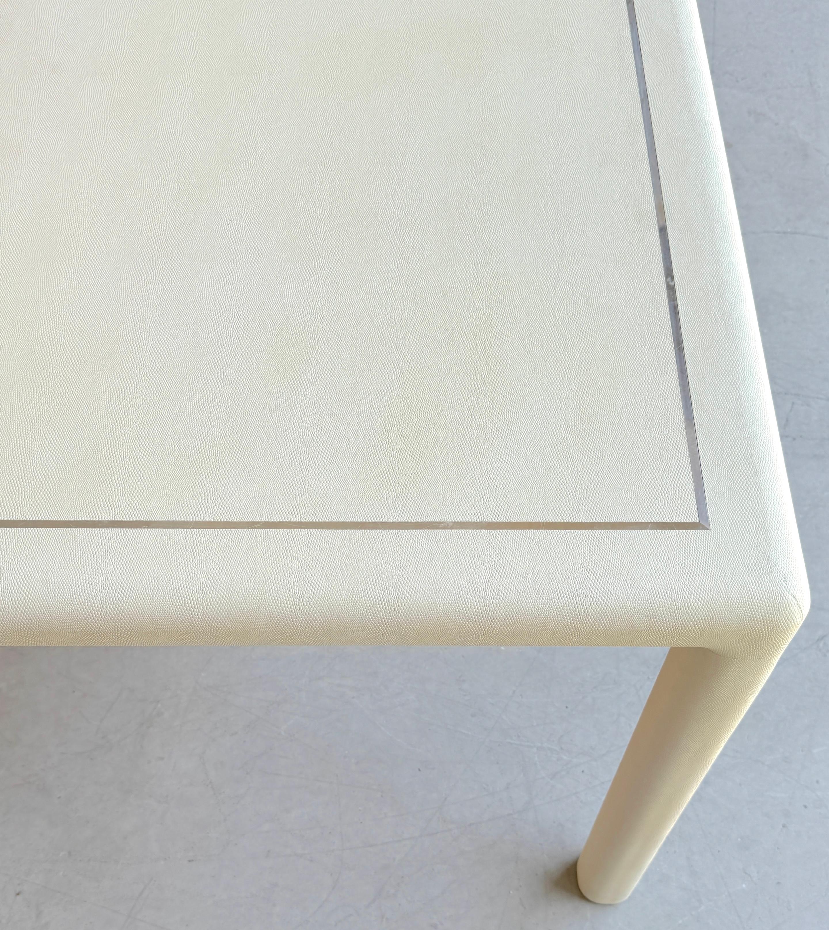 White Lizard Leather and Chrome Parsons Games Table, Attributed Karl Springer
Circa 1980s

Fresh from a Palm Beach estate, this exquisite White Lizard Leather and Chrome Parsons Games Table is attributed to the renowned designer Karl Springer. This