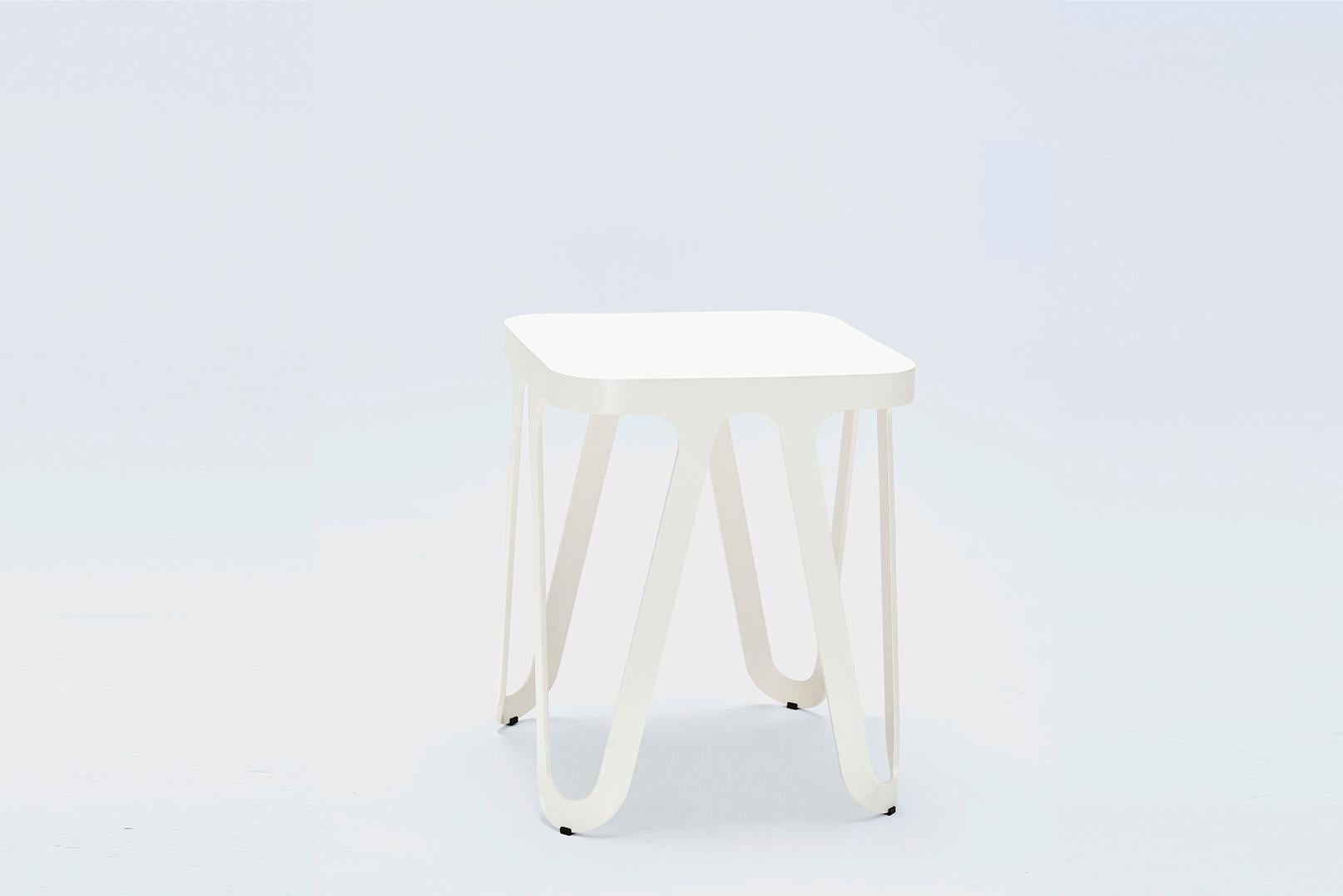 White Loop stool by Sebastian Scherer
Dimensions: D38 x W38 x H44 cm
Material: Aluminium
Weight 3.5 kg
Also available in wood.
Also available in colours: ocean blue, silk grey, jet black, coral red, lemon yellow, rose, signal white.

The Loop