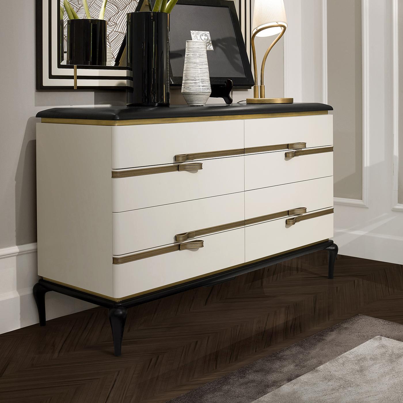 A statement piece to be paired with the white drawer and bedside table by the same designer to create a stunning, cohesive look in a modern bedroom, this splendid dresser is made of white-lacquered ash-veneered MDF and plywood, combined with a