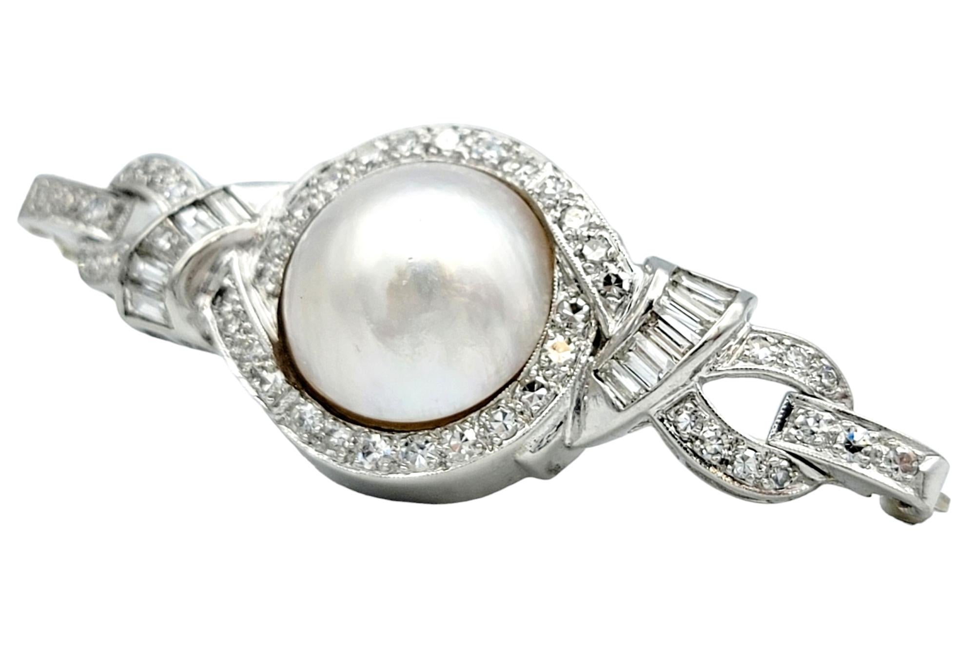 Contemporary White Mabe Pearl and Diamond Ribbon Style Platinum Brooch with Milgrain Detail