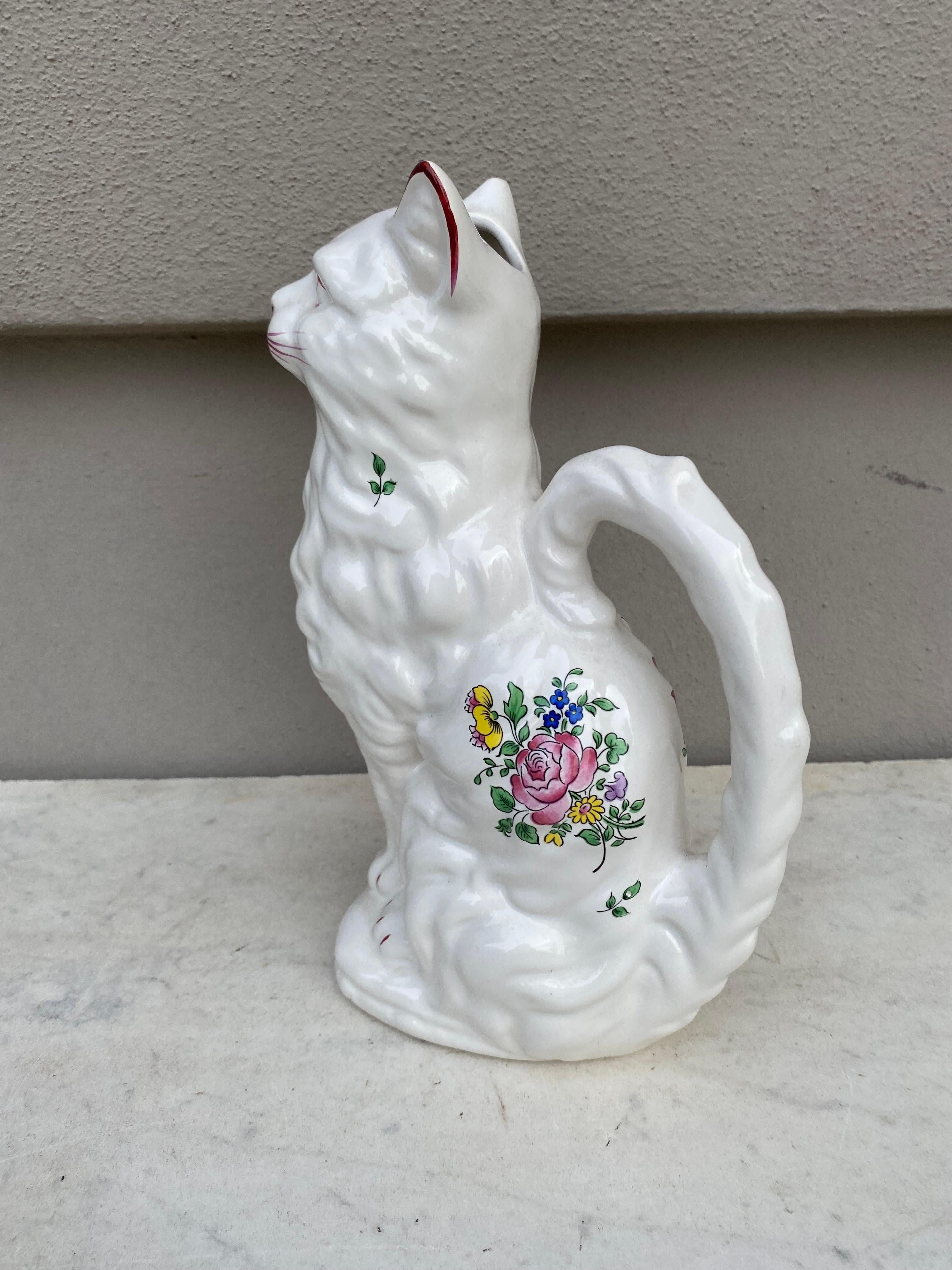 White Majolica cat pitcher Keller & Guerin Luneville, circa 1900.
Decorated with flowers.