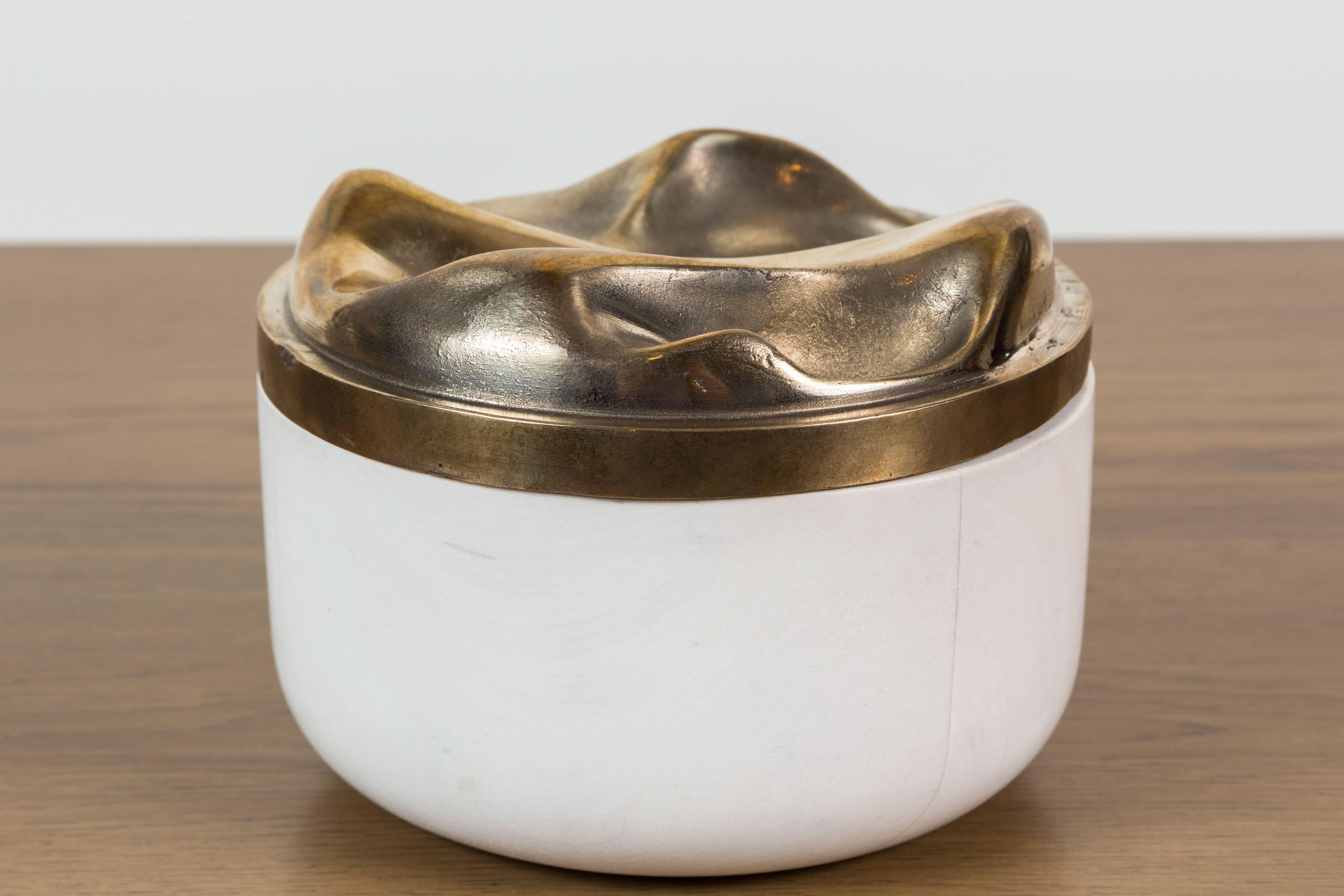 Bleached maple and cast bronze round box by artist Vincent Pocsik in collaboration with Lawson-Fenning. Features a sculptural carved wood interior. Made of natural materials, this decorative object can be accessorized on tabletop, book shelf, or